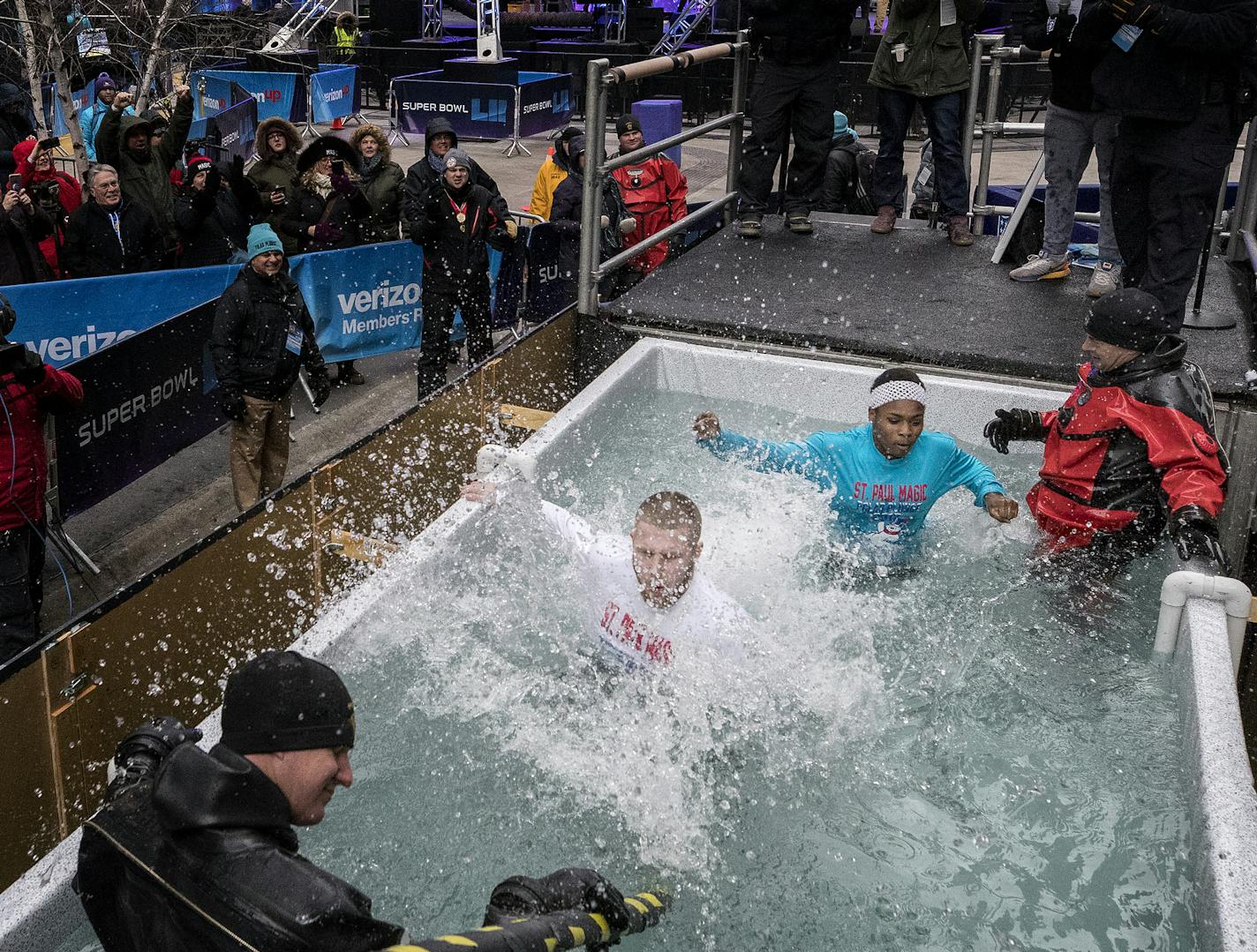 Jarid Revees and Rachel Thomas, 17, both of Cottage Grove jumped in the water during the Polar Plunge at Super Bowl Live on Nicollet Mall in Minneapolis. ] CARLOS GONZALEZ &#x2022; cgonzalez@startribune.com - Minneapolis, MN - January 30, 2018 - Polar Plunge Super Bowl Live at the Verizon stage on Nicollet Mall at 8th Street.