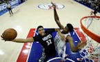 Karl-Anthony Towns went up for a shot against Philadelphia's Joel Embiid during a game in January, 2017