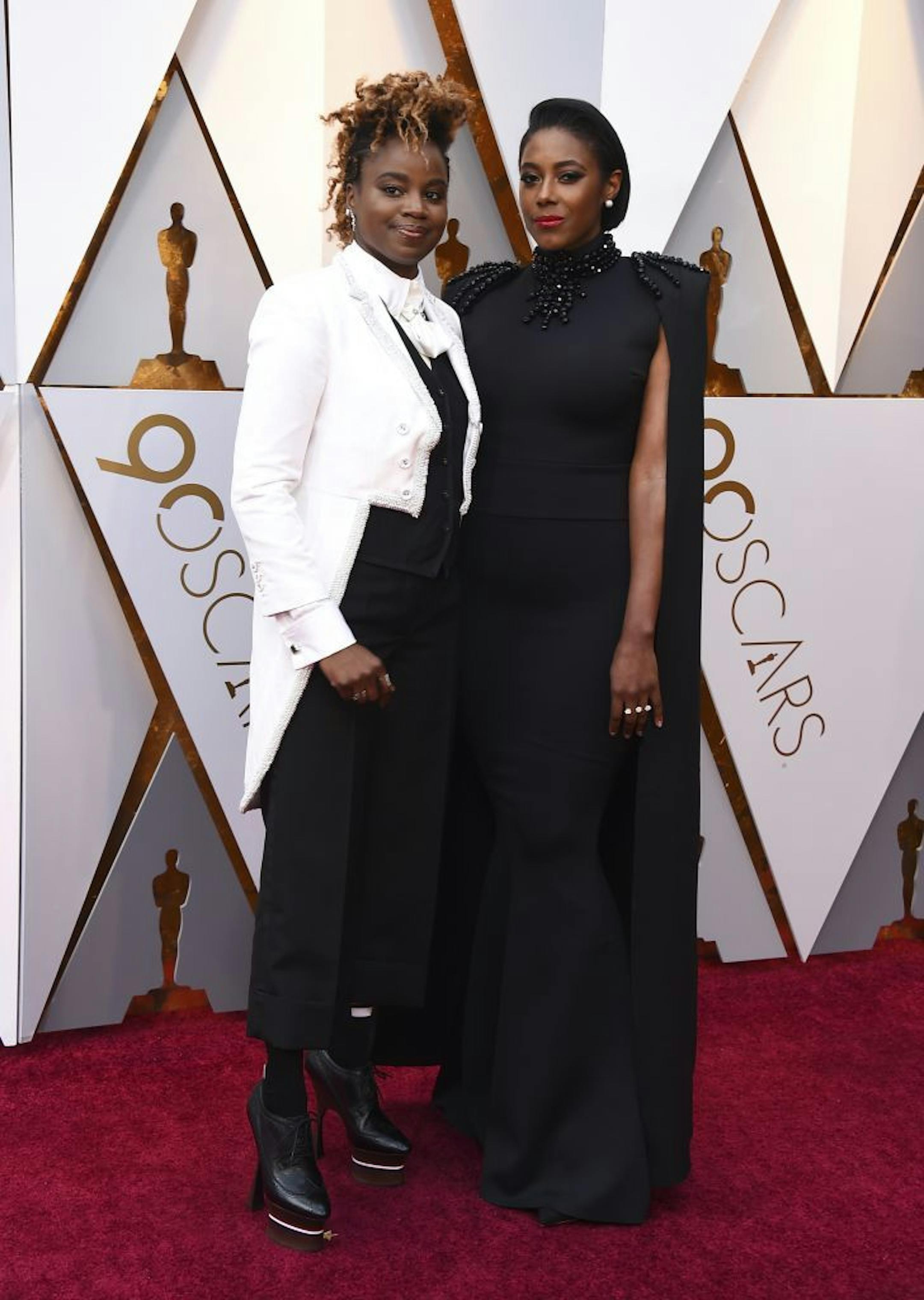 Dee Rees, left, and Sarah M. Broom arrive at the Oscars on Sunday, March 4, 2018, at the Dolby Theatre in Los Angeles.