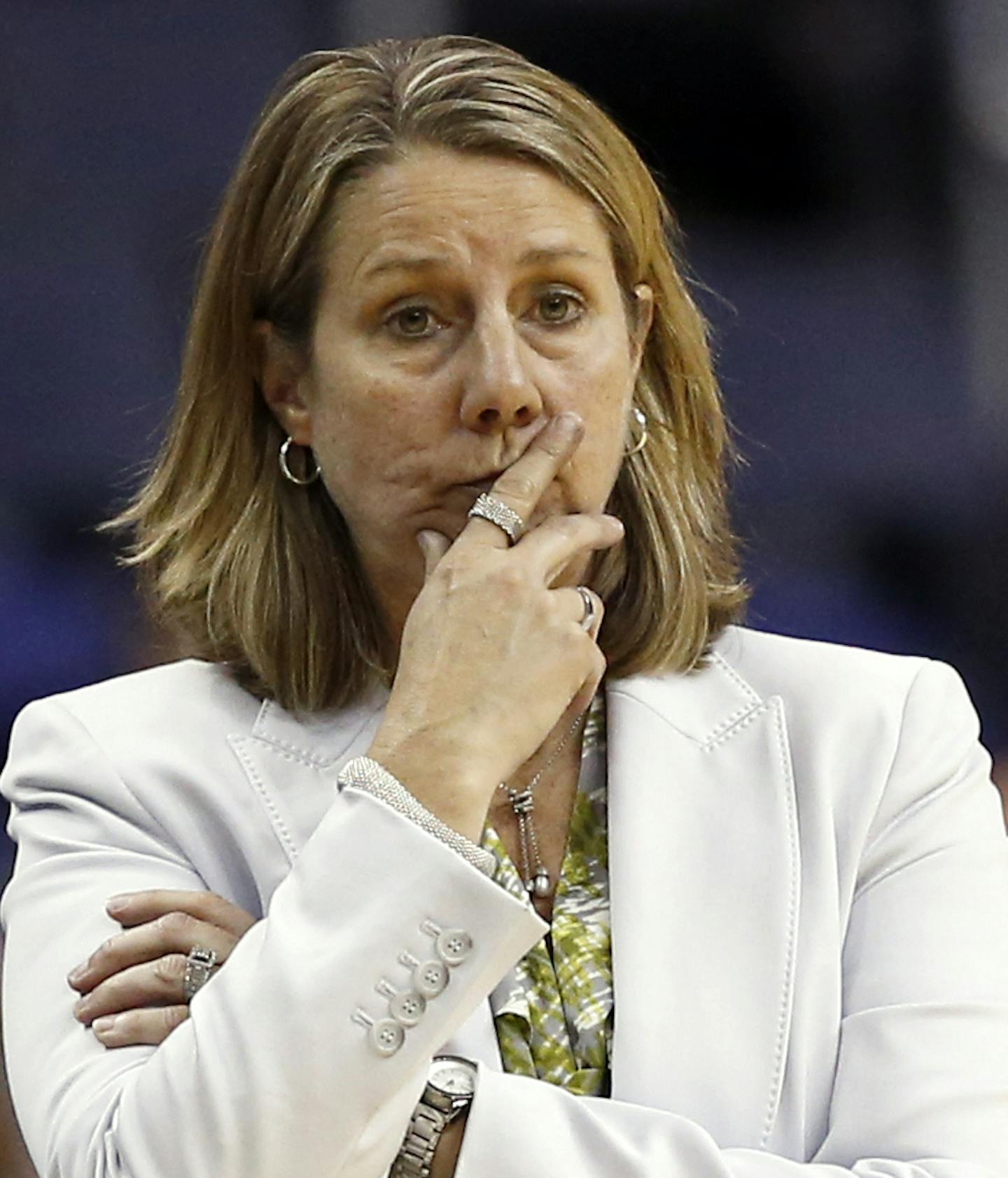 Minnesota Lynx head coach Cheryl Reeve stands on the court during the second half of a WNBA basketball game against the Washington Mystics, Sunday, Aug. 16, 2015 in Washington. The Mystics won 77-69. (AP Photo/Alex Brandon) ORG XMIT: VZN10