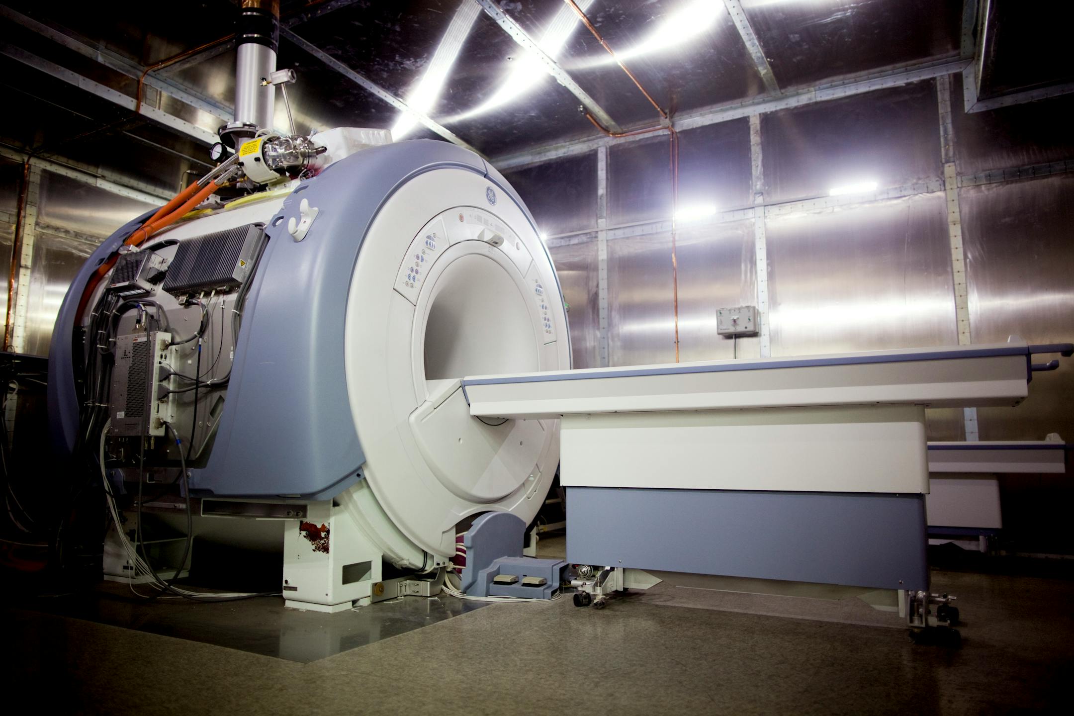 A General Electric Co. healthcare unit medical magnetic resonance imaging (MRI) device awaits testing at the company's production facility in Beijing, China, on Friday, July 22, 2011. General Electric Co.'s healthcare unit, the world's biggest maker of medical-imaging machines, said it will move the headquarters for its more than 100-year-old X-Ray business to China to tap emerging market growth. Photographer: Nelson Ching/Bloomberg