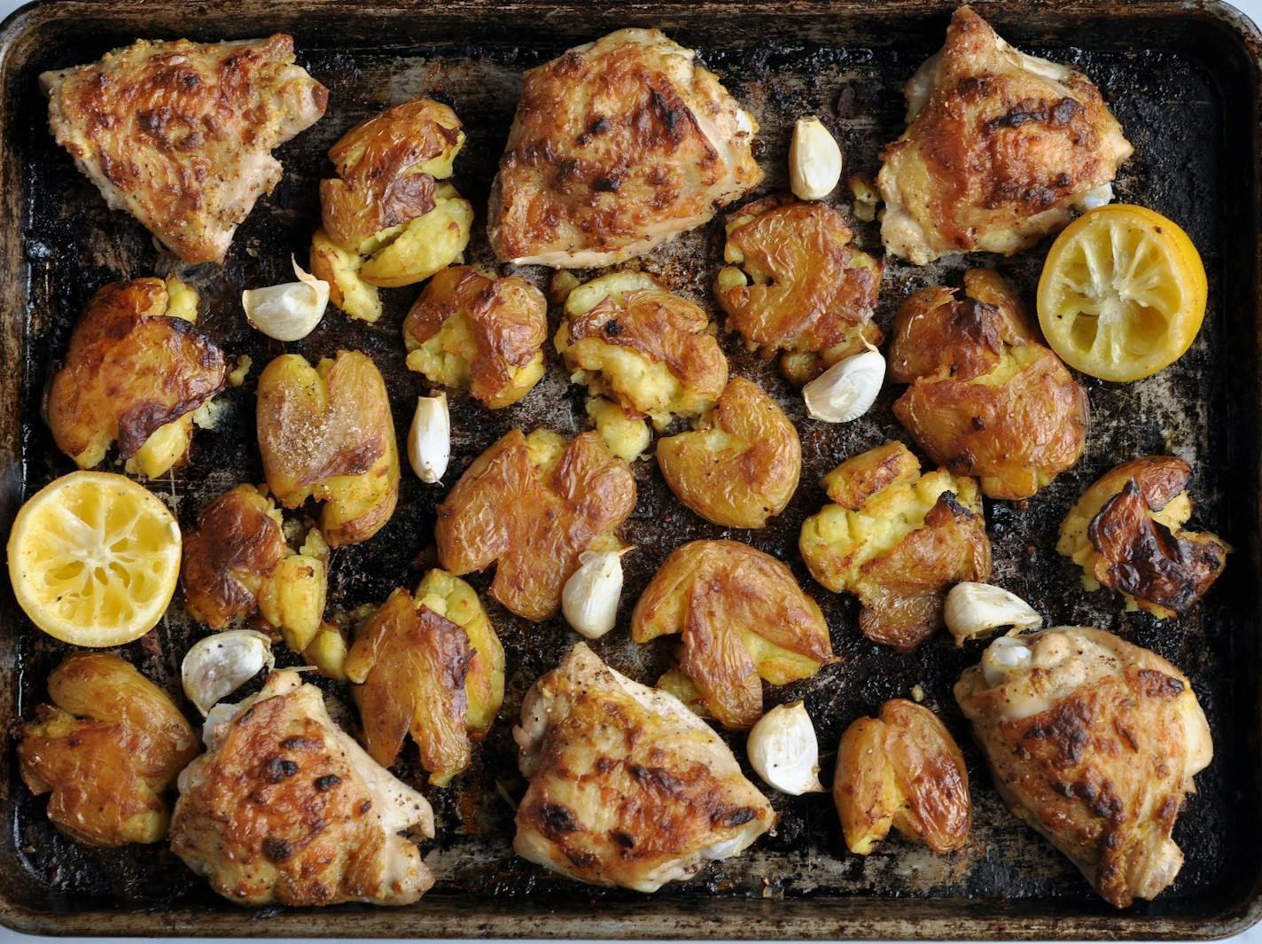 Sheet Pan Roasted Lemon Dijon Chicken Thighs with Smashed Potatoes for Dinner Tonight column. Credit: Meredith Deeds, Special to the Star Tribune