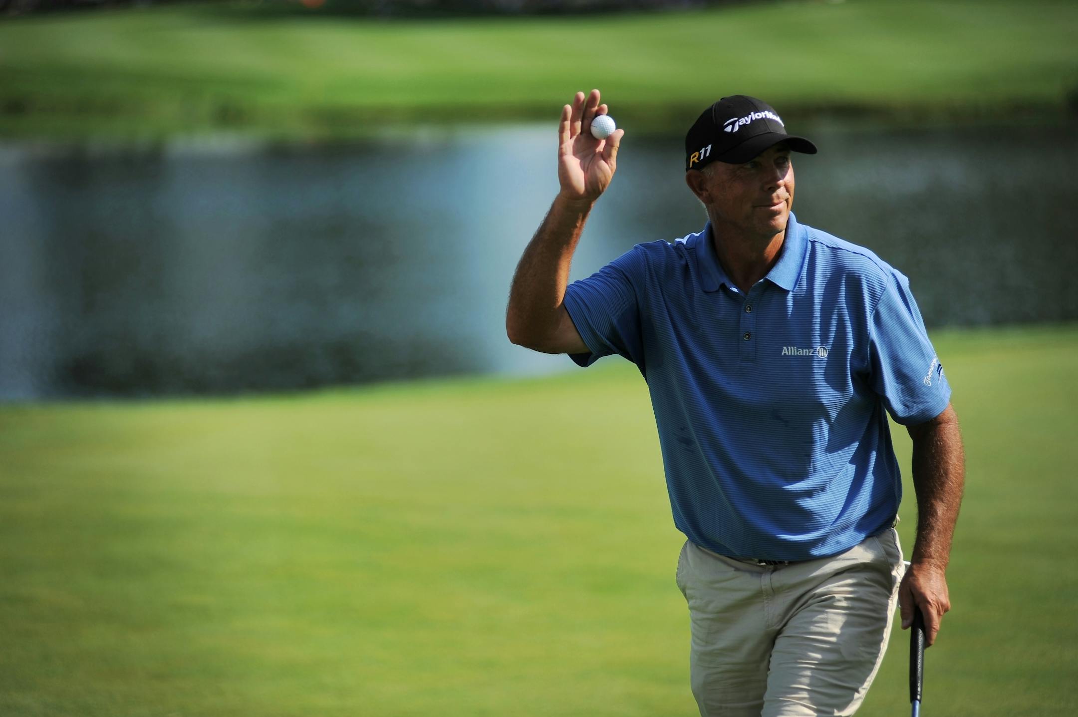 Tom Lehman held up his ball after finishing the final round of the 3M championship August 7, 2011 held at TPC Twin Cities in Blaine. Jay Haas took first with Kenny Perry in second and Tom Lehman came in third.