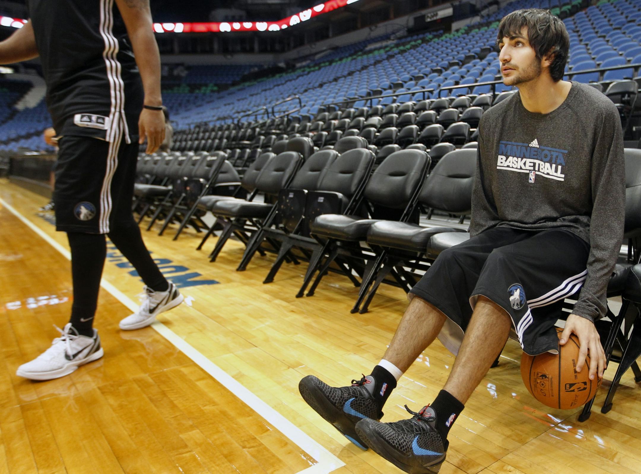 At the Timberwolves scrimmage at Target Center, Ricky Rubio dribbled between the legs while waiting for the start of scrimmage .