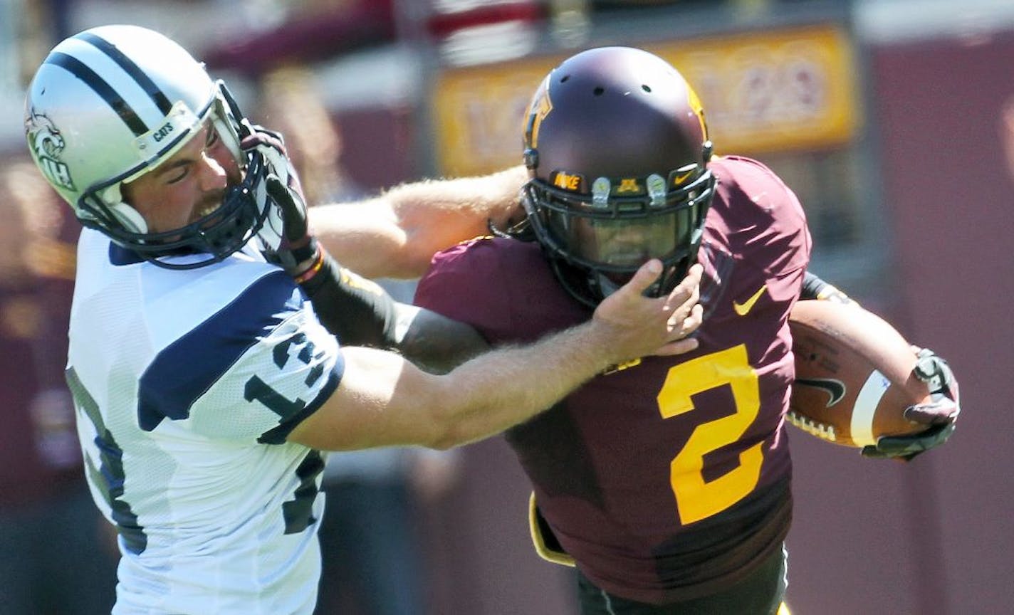 Gophers senior Troy Stoudermire, right, needs only 14 yards to break the NCAA career kick-return yardage record, but the strong leg of Texas Tech's Kramer Fyfe might keep him pinned in the end zone.