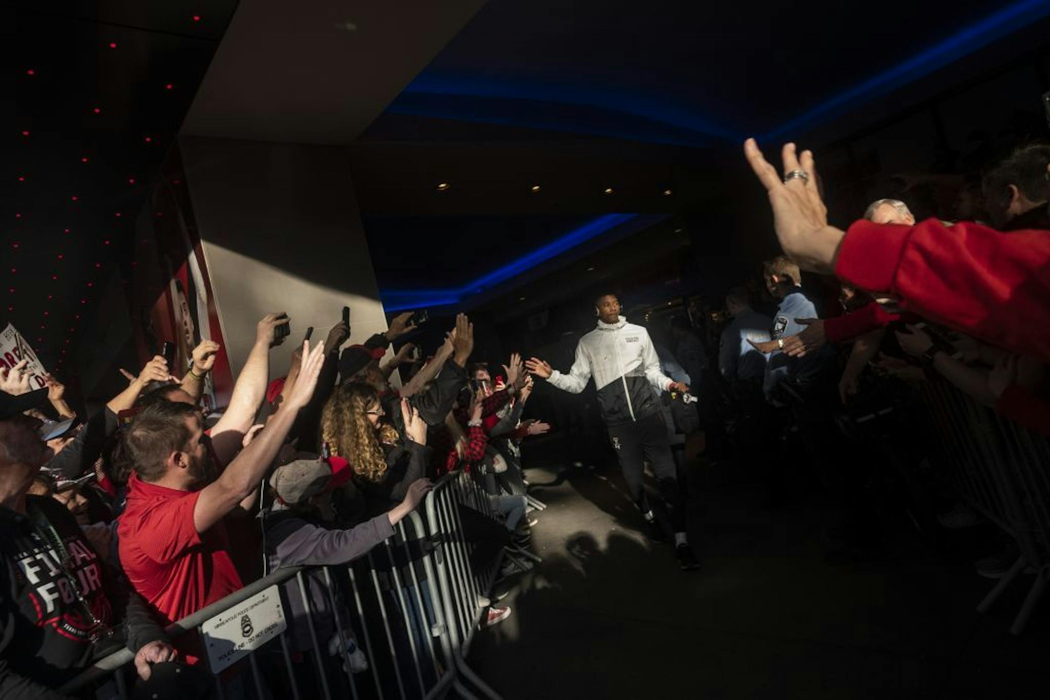 Texas Tech fans send their players off including Jarrett Culver as they head out to U.S. Bank Stadium to face Virginia in the NCAA men basketball championship game.