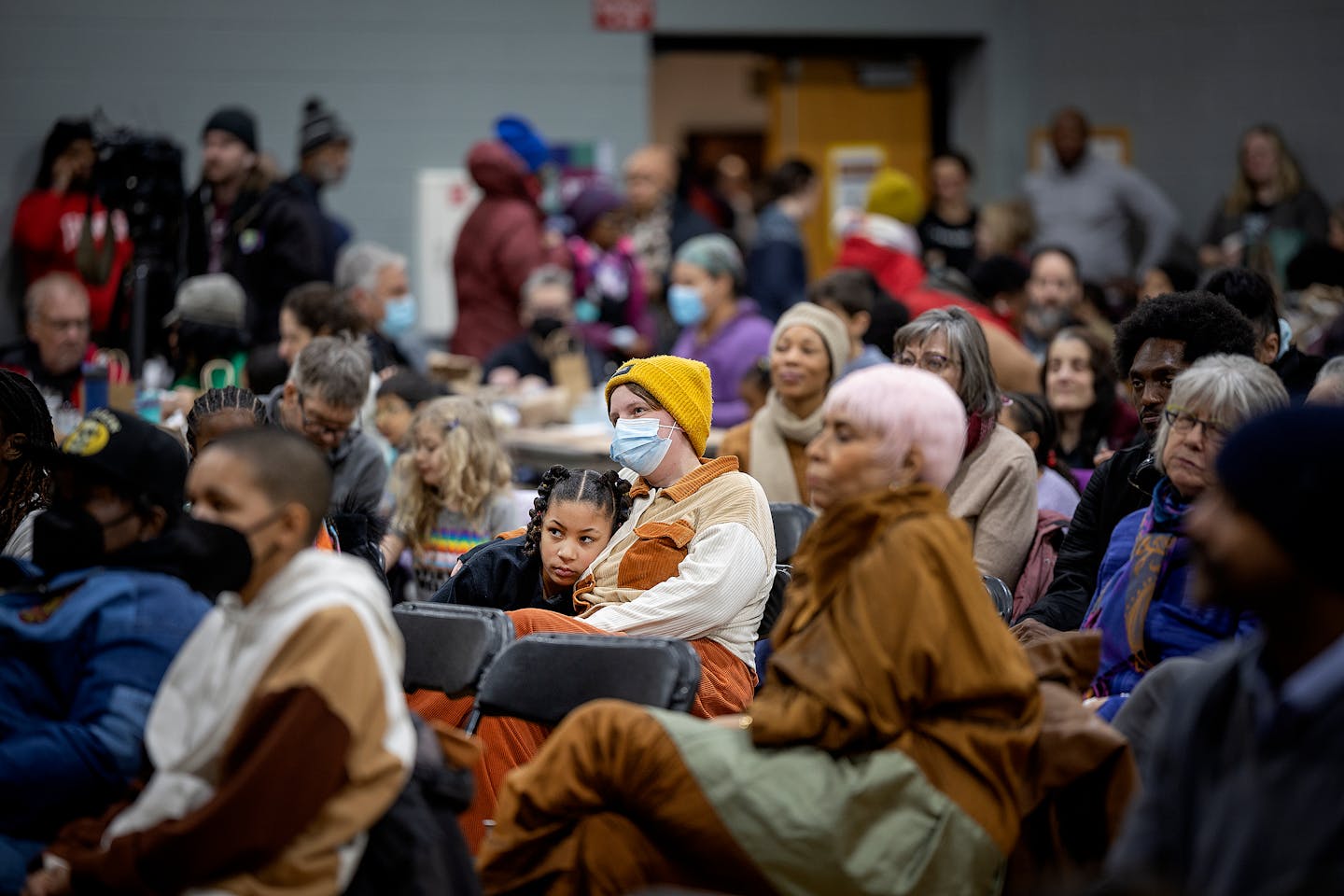 Families and participants listen to a speaker at the Rev. Dr. Martin Luther King Jr. Day Celebration in Powderhorn Park in Minneapolis, Minn., on Monday, Jan. 15, 2024. This MLK event will mark the 26th year honoring the life and legacy of Rev. Dr. Martin Luther King Jr., which continues to fuel a positive impact on our lives today. His compelling vision and actions toward advancing equity and justice inspire countless community leaders and grassroots movements, around the world. ] Elizabeth Flores • liz.flores@startribune.com