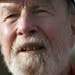 FILE - In this May 5, 2006 file photo, Pete Seeger talks during an interview in Beacon, N.Y. The banjo-picking troubadour who sang for migrant workers