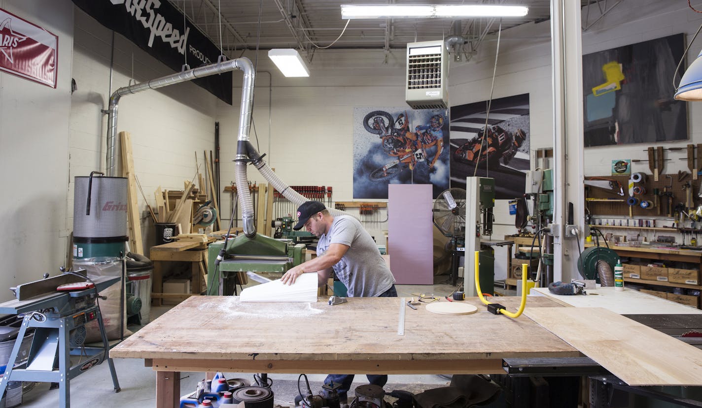 Kevin Fitzke, a experiential development manager at SixSpeed advertising agency, works in their St. Louis Park office on Wednesday, August 19, 2015. ] LEILA NAVIDI leila.navidi@startribune.com /