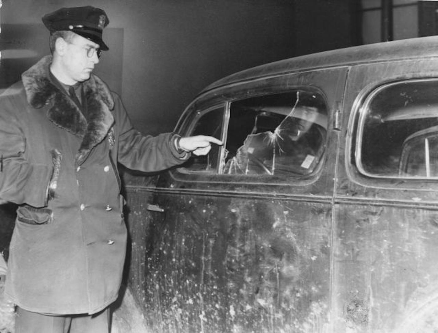 Kasherman's bullet-riddled car.