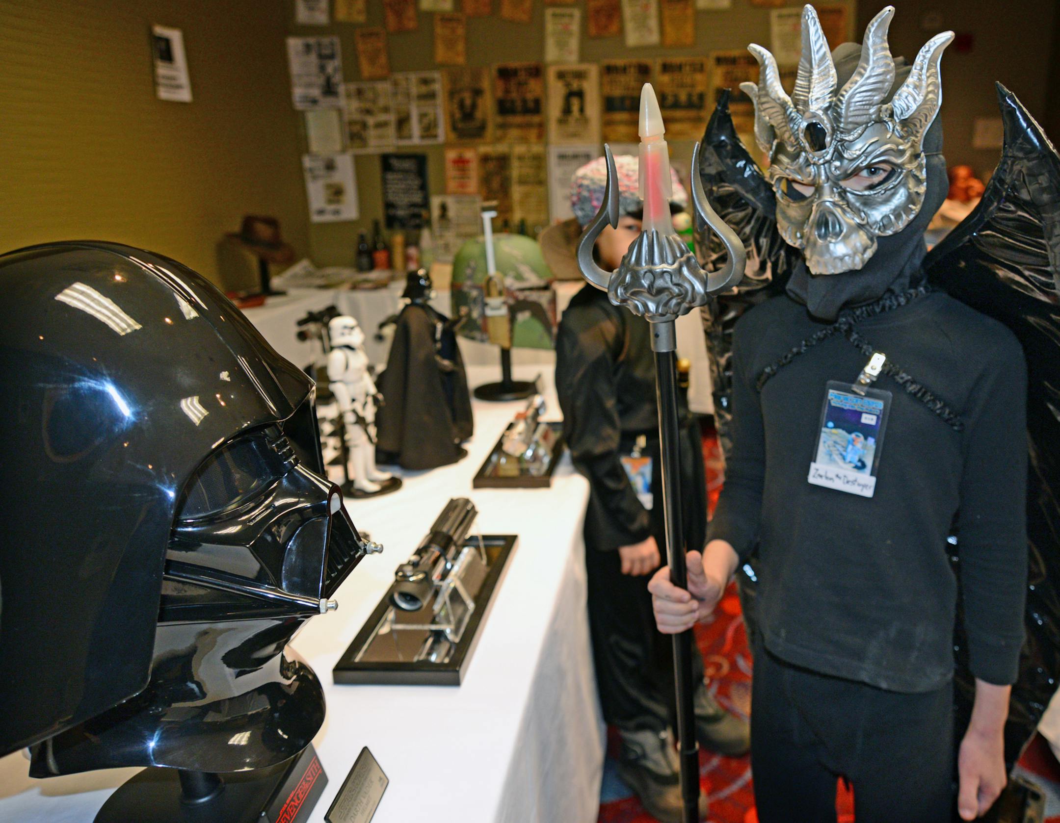 MarsCon 2013 was held at the Crowne Plaza hotel in Bloomington over the weekend it featured a mishigas of Sci Fi and horror characters with hundreds of people attending.. Arie Copley-Radder 10 years old of Minneapolis played the part of Zarlon the Destroyer, he was checking out the Darth Vader mask in the prop room.] Richard.Sennott@startribune.com Richard Sennott/Star Tribune. , Bloomington Minn. Sunday 3/3/13) ** (cq) ORG XMIT: MIN1303031823261181
