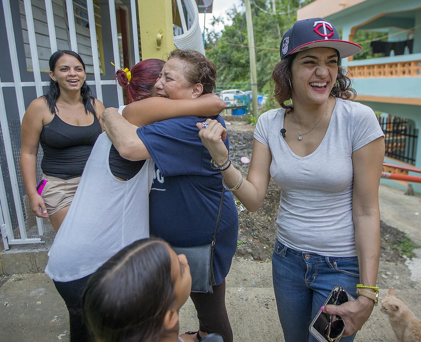 Maria Isa P&#xc8;rez-Hedges and her mother Elsa Vega-Perez, center, were welcomed with open arms as they arrived with a team to Comerio, Puerto Rico from Minneapolis, MN, to help provide resources post Hurricane Maria, Tuesday, April 17, 2018. ] ELIZABETH FLORES &#xef; liz.flores@startribune.com