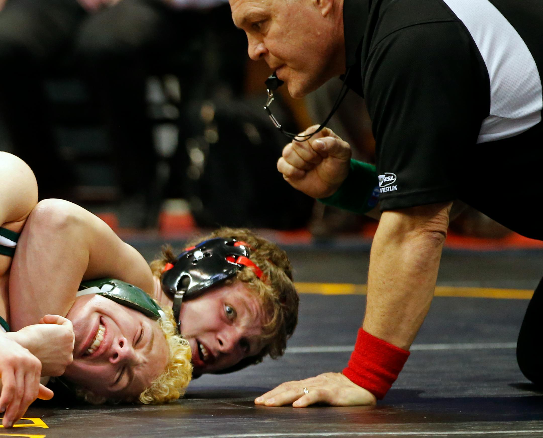 At the State Wrestling team finals in Class A, 152lbs. Dylan Craig (Kenyon-Wanamingo) took control against Charlton Wake (Frazee) and won 15-0. (Richard Tsong-Taatarii/Star Tribune)