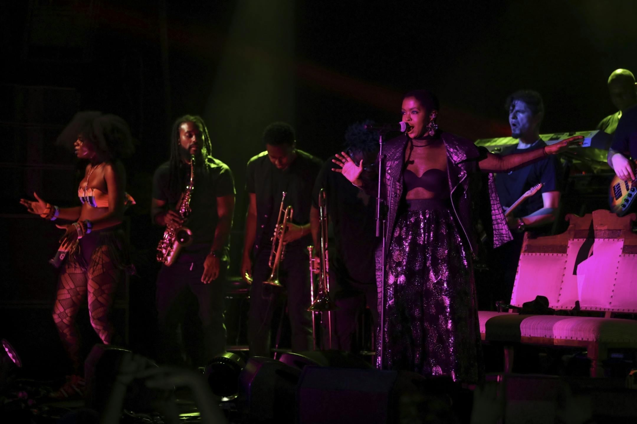 Lauryn Hill on the First Ave. stage with her band early in her set Sunday night.