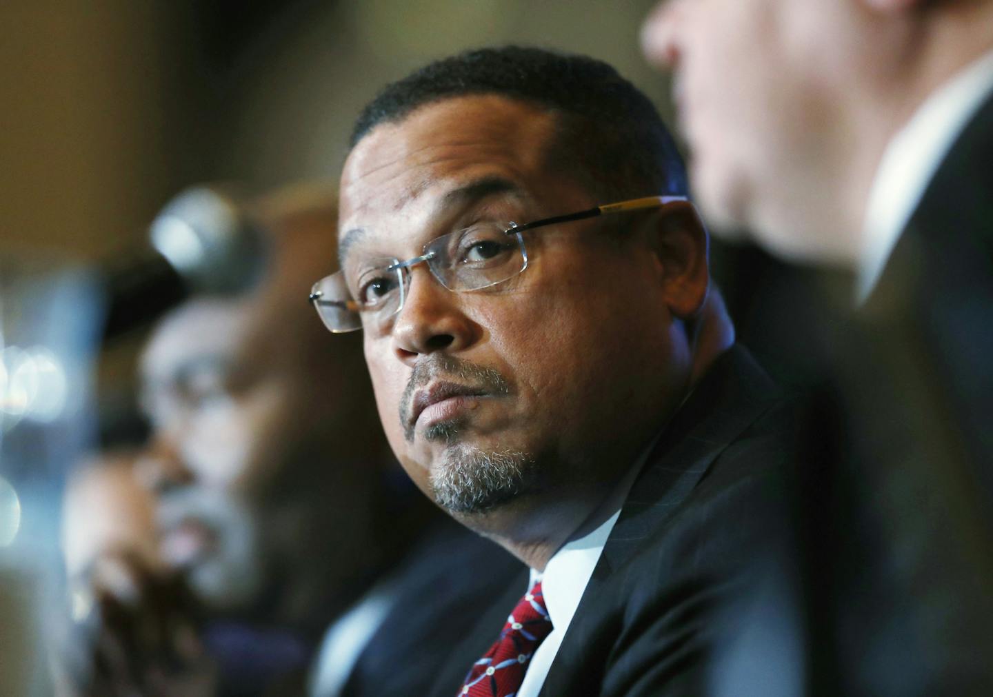 FILE - In this Dec. 2, 2016 file photo, U.S. Rep. Keith Ellison, D-Minn., listens during a forum on the future of the Democratic Party, in Denver. Ellison, who is currently running to be the next chair of the Democratic National Committee, announced Monday, Jan. 16, 2017, he is boycotting Donald Trump's presidential inauguration on Friday. (AP Photo/David Zalubowski, File) ORG XMIT: MIN2017011818232066