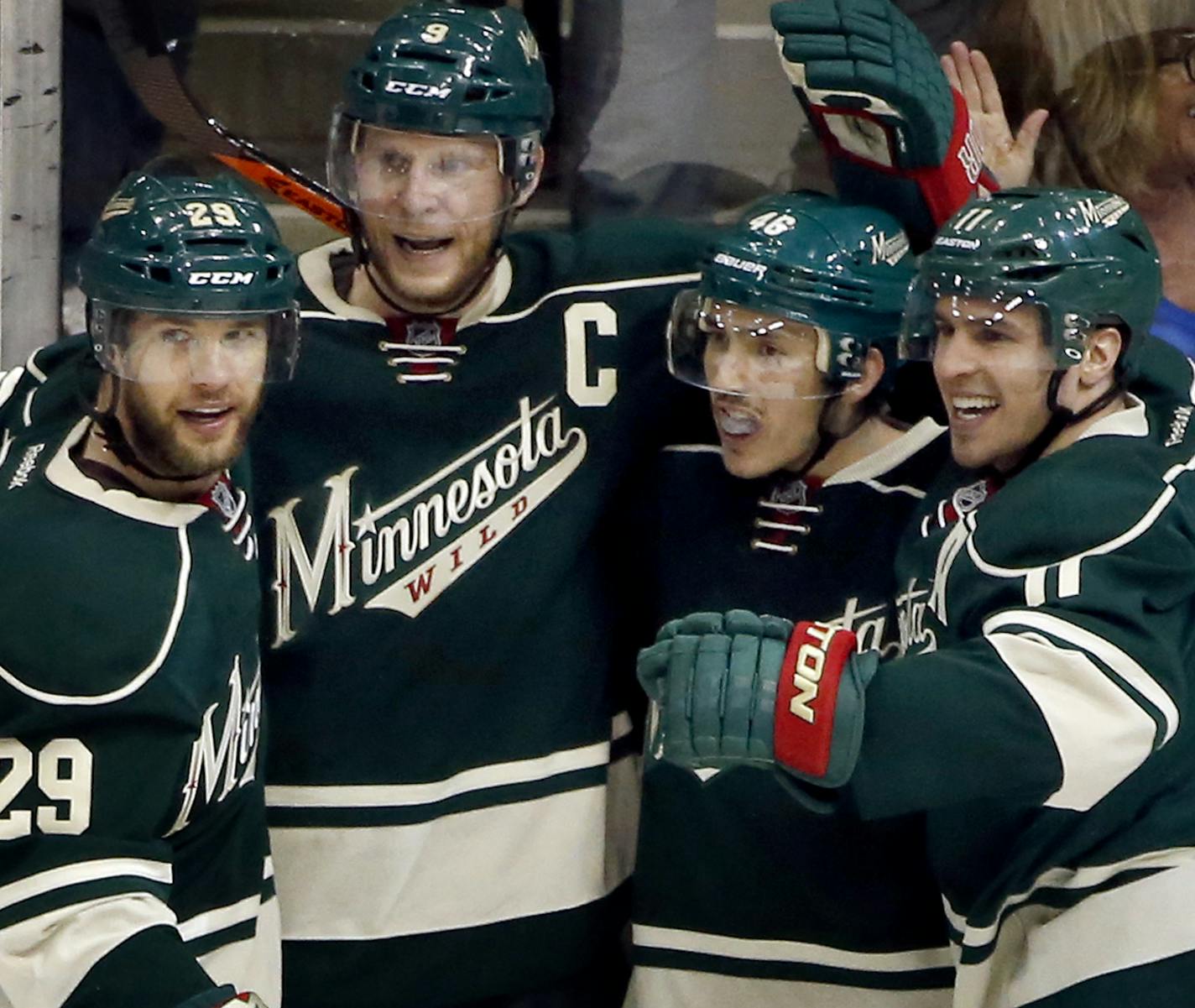 Jared Spurgeon (46) celebrated with teammates after scoring a goal in the third period. ] CARLOS GONZALEZ cgonzalez@startribune.com - May 9, 2014, St. Paul, Minn., Xcel Energy Center, NHL, Minnesota Wild vs. Chicago Blackhawks, Stanley Cup Playoffs Round 2, Game 4