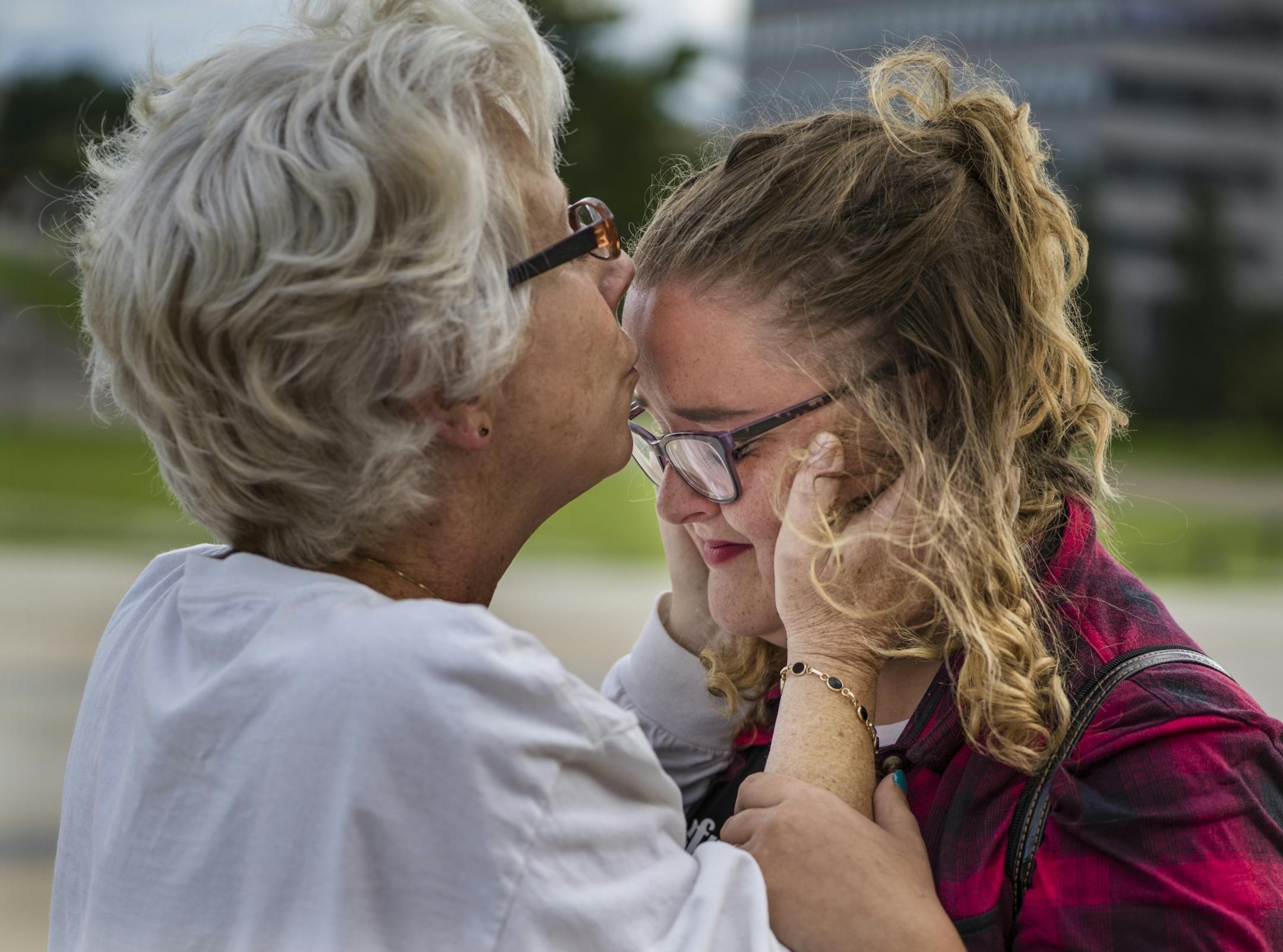 Erin Nanasi, a sexual assault survivor from the Children's Theatre comforted Sarah Kaleigh Seifert,21, who spoke of her rape by an acquaintance.