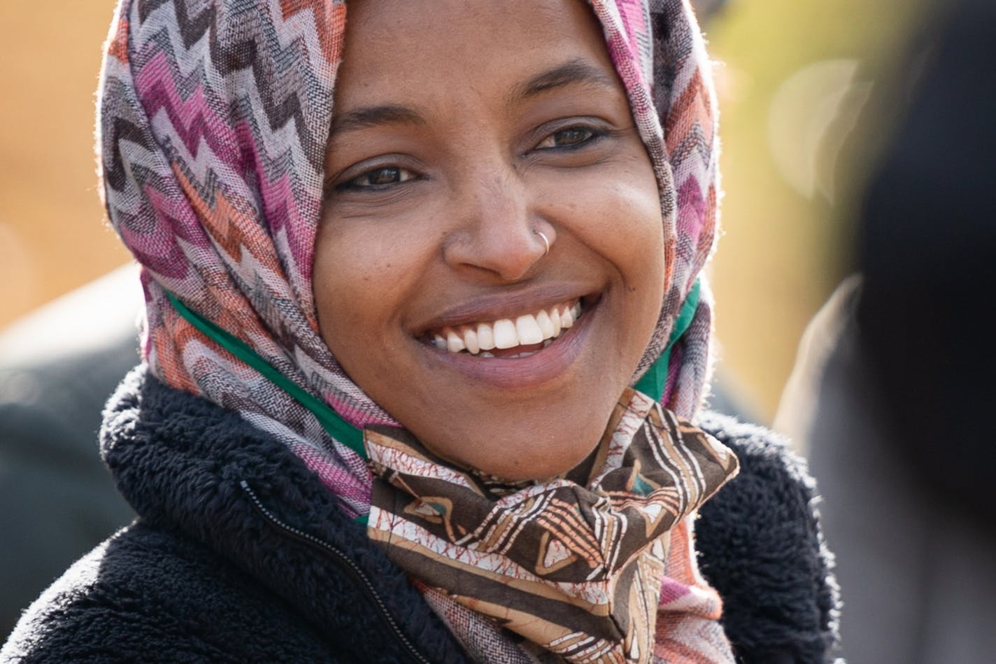 U.S. Rep Ilhan Omar spoke to campaign staffers and volunteers in Powderhorn Park in Minneapolis while campaigning this fall.