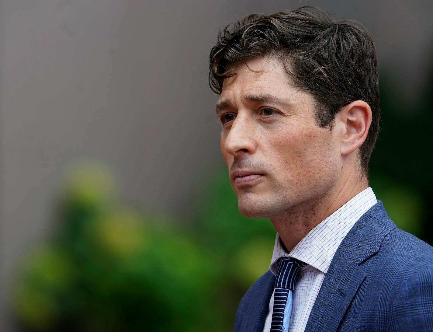 Mayor Jacob Frey took a question during a press conference outside the Hennepin County Government Center Tuesday in Minneapolis. ]