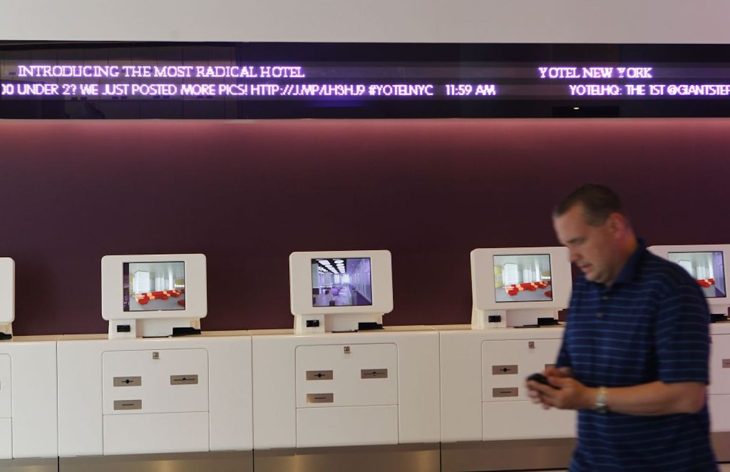 Check-in kiosks greet clients at the Yotel in New York City, one of the most talked about additions to the city's hotel scene.