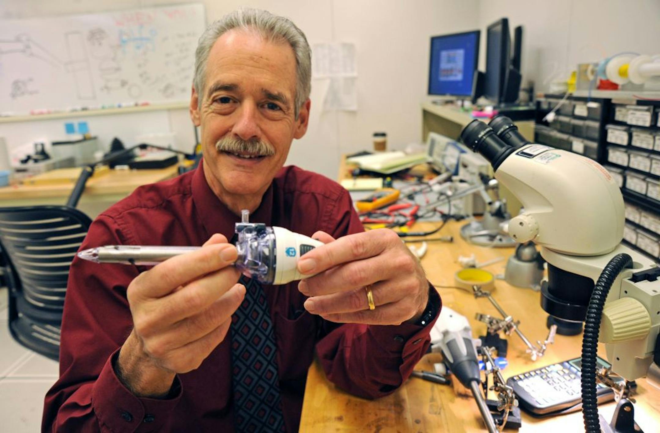 Arthur Erdman held a Trocar used in Laparoscopic surgery, which is minimally invasive surgery. in one of the design center labs at the U of M Medical Devices Center on Thursday April 5, 2011.The largest trend in medical device industry is geared towards devices that are minimally invasive.