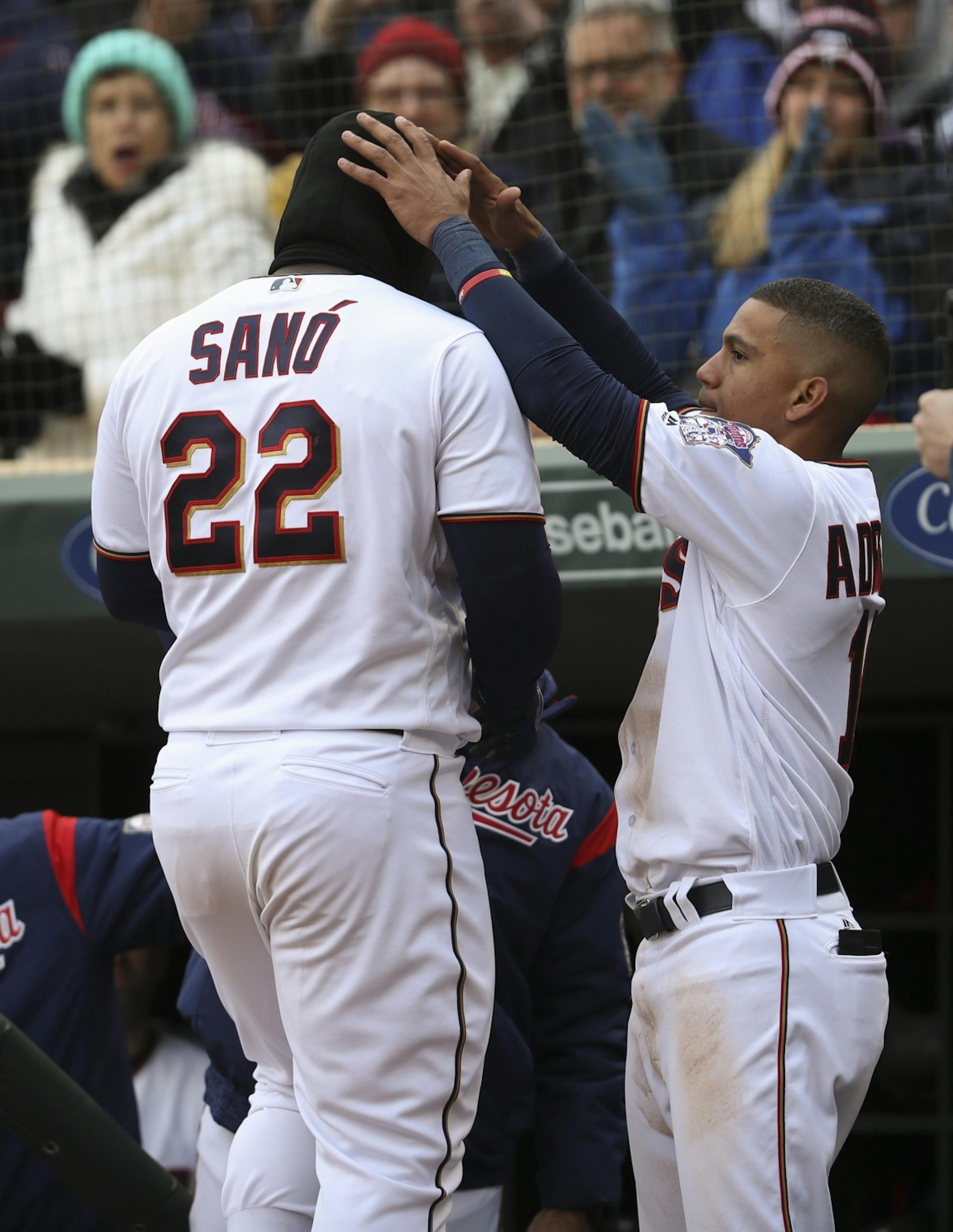 Minnesota Twins third baseman Miguel Sano was congratulated by Minnesota Twins shortstop Ehire Adrianza after his game-tying two run homer in the sixth inning Thursday afternoon.