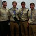 Paul Fisher, second from left, received his Eagle Scout Award July 12 at a special Court of Honor Ceremony at the Champlin Ice Forum. He joins his dad