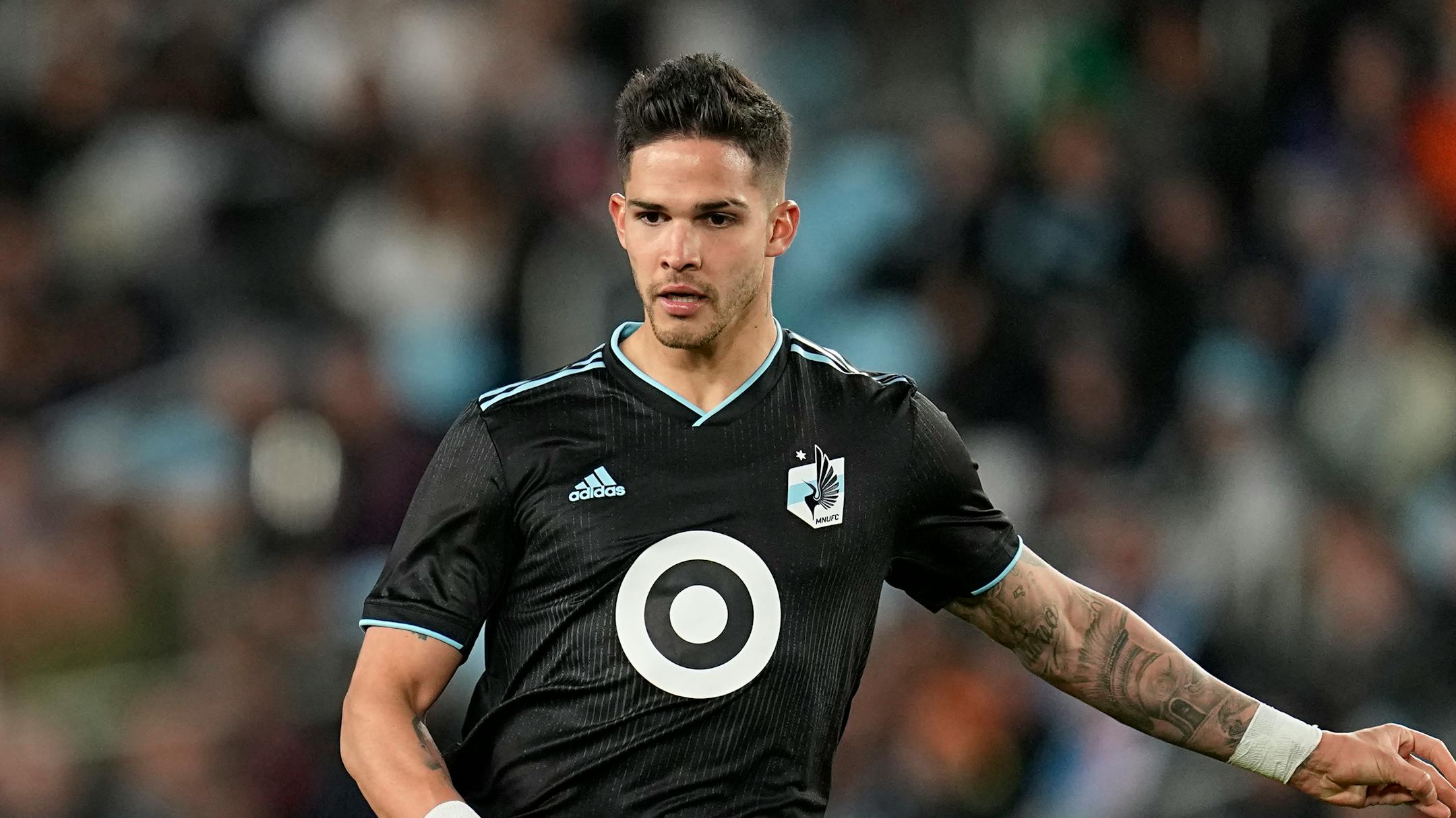 Minnesota United forward Luis Amarilla runs across the field during the second half of an MLS soccer match against FC Dallas in St. Paul, Minn., Sunday, April 30, 2023. (AP Photo/Abbie Parr)