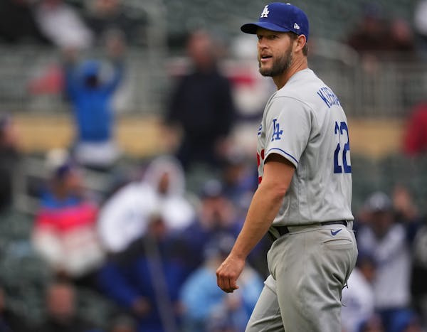 Los Angeles Dodgers starting pitcher Clayton Kershaw (22) threw his last pitch in the 7thin inning . Kershasw was just 6 outs from the chance at a per
