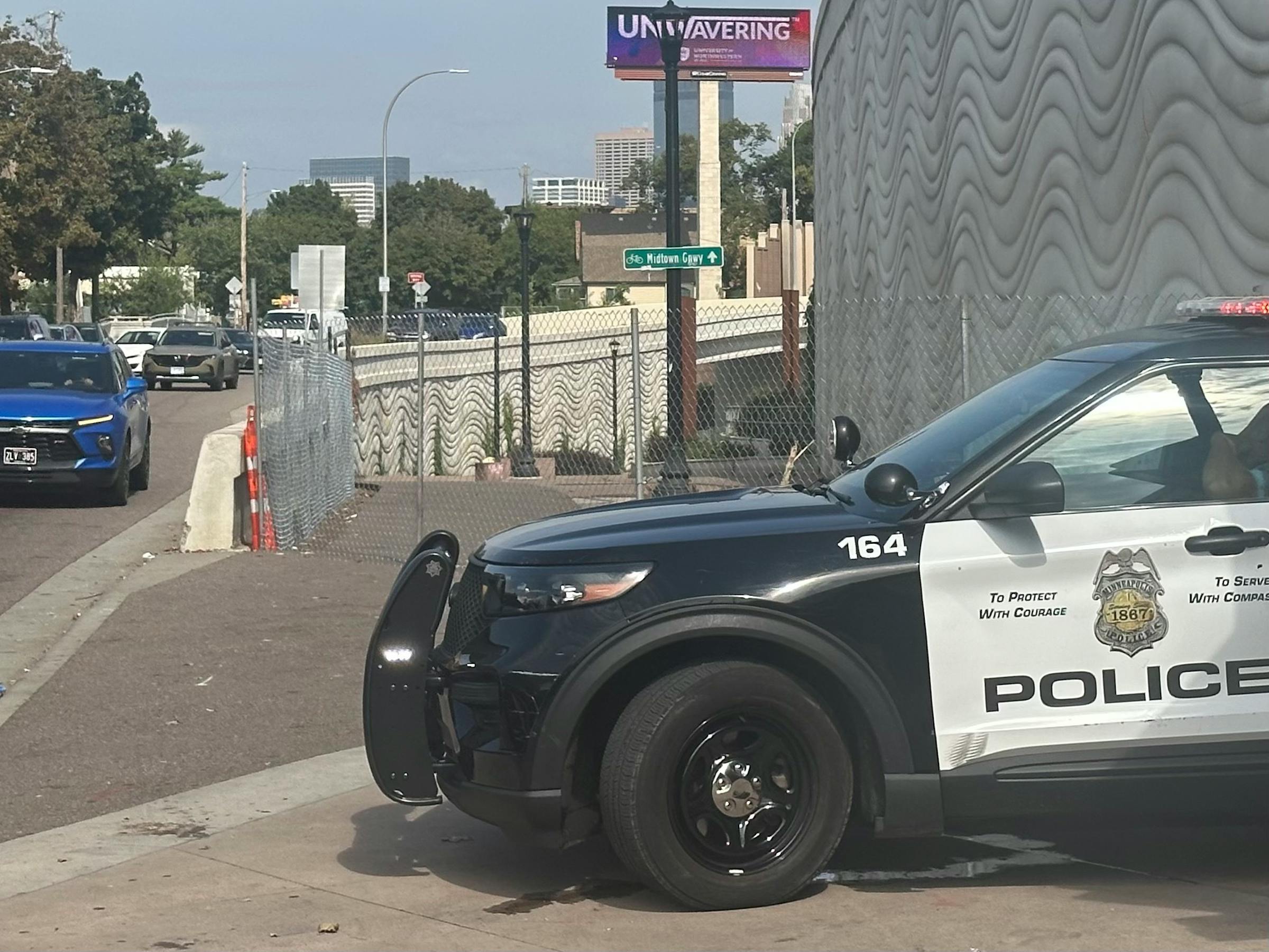 Minneapolis ramps up police presence, erects fences following 2 mass shootings along Lake Street