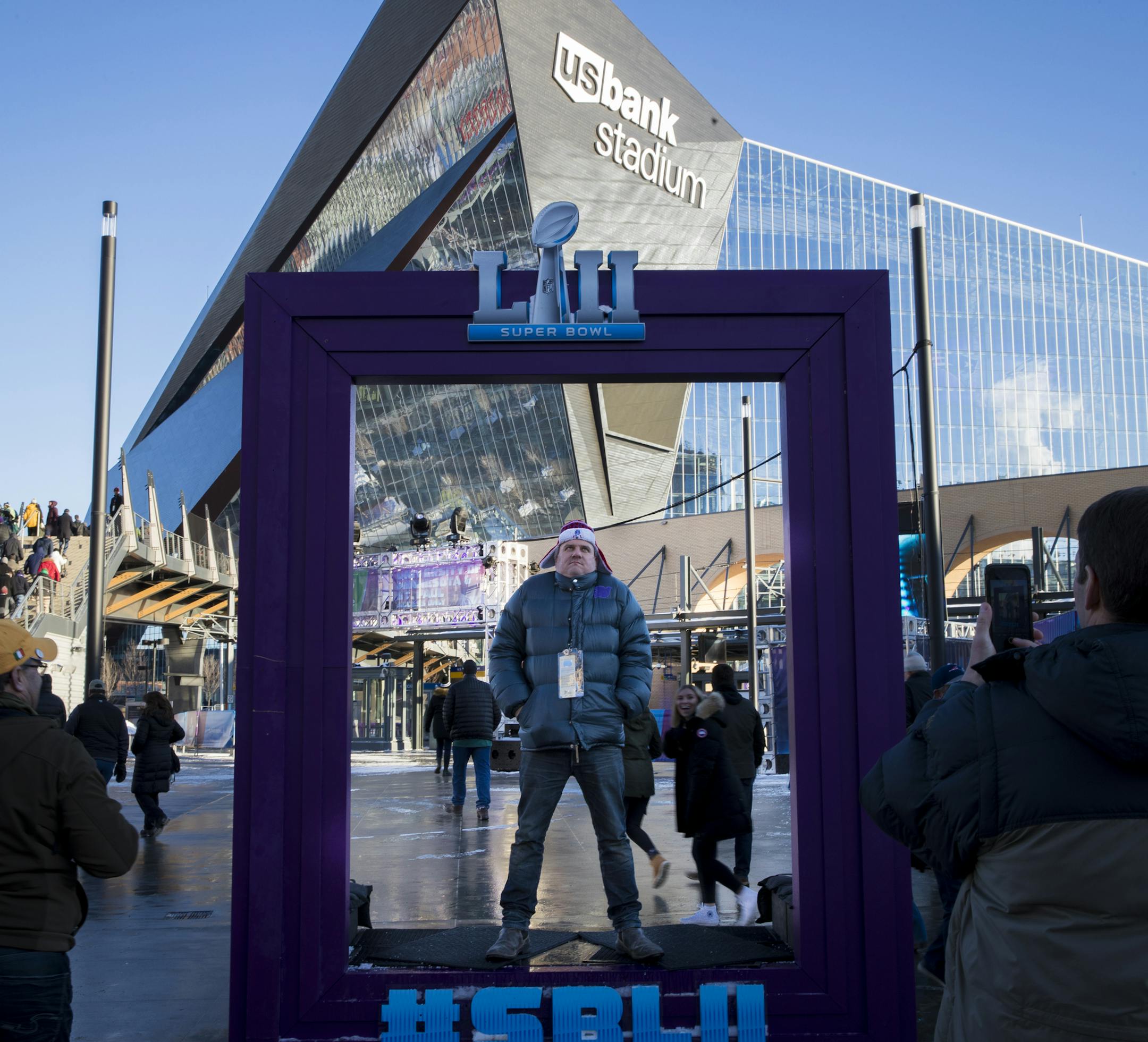 Michael O'Malley, of Los Angeles, showed his displeasure with the cold weather as he posed for a picture before entering U.S. Bank Stadium for Super Bowl LII on Sunday, February 4, 2018, in Minneapolis, Minn. ] RENEE JONES SCHNEIDER ¥ renee.jones@startribune.com Super Bowl 52 coverage outside stadium.