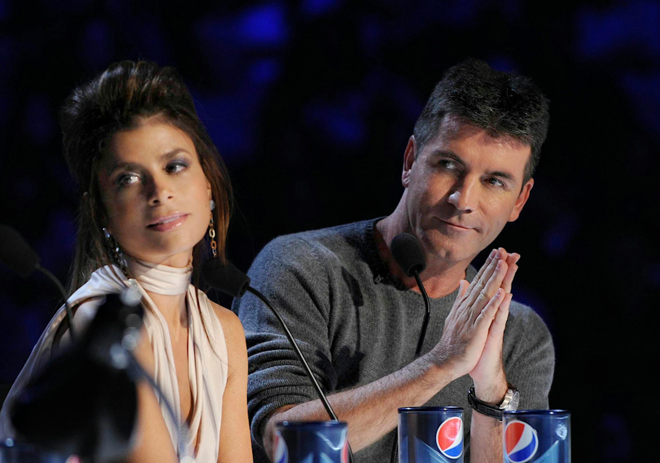 Simon Cowell, right, and Paula Abdul are shown during auditions for the singing competition series "The X Factor."