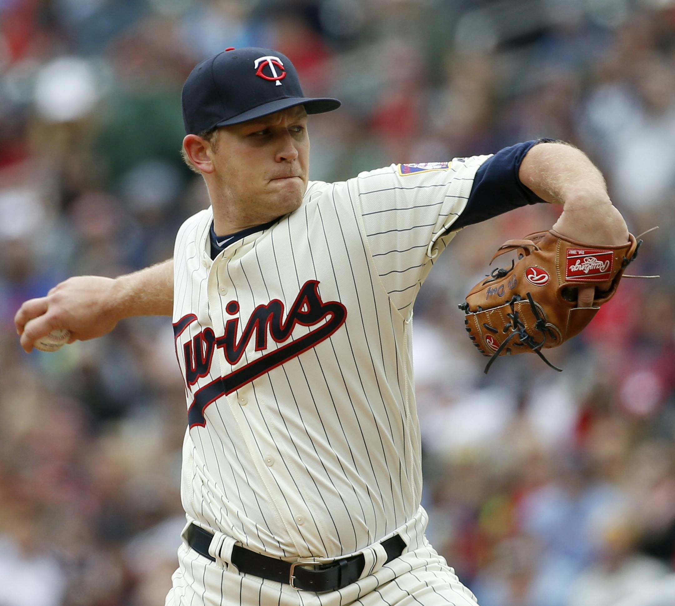 Minnesota Twins starting pitcher Tyler Duffey (56) delivers to the Detroit Tigers during the first inning of a baseball game in Minneapolis, Saturday, April 30, 2016. (AP Photo/Ann Heisenfelt)