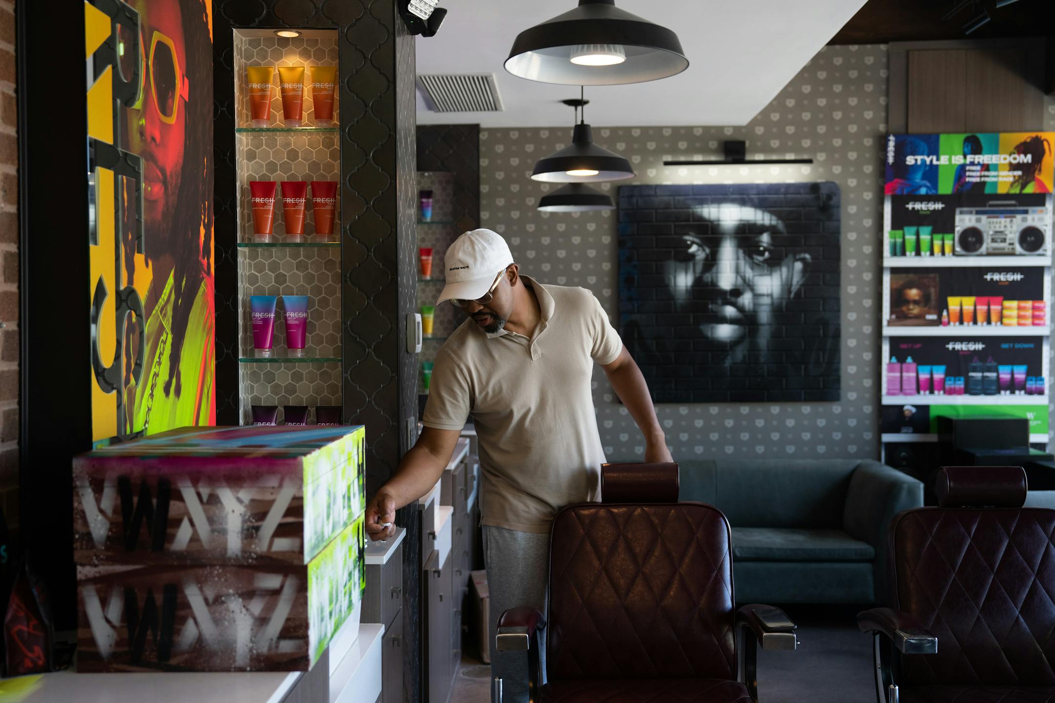 Houston White worked in his "office" which is a future barbershop in Camden Town.