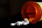 FILE - This Aug. 29, 2018, file photo shows an arrangement of Oxycodone pills in New York. A new study shoots down the notion that medical marijuana l