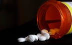 FILE - This Aug. 29, 2018, file photo shows an arrangement of Oxycodone pills in New York. A new study shoots down the notion that medical marijuana l