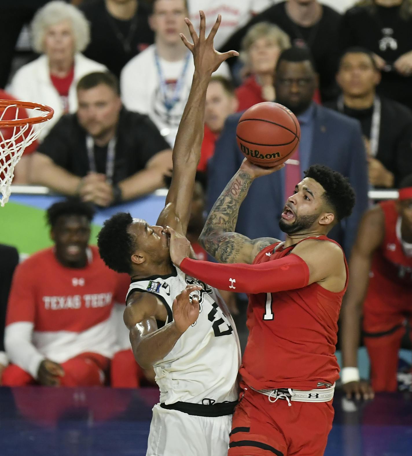 Texas Tech guard Brandone Francis (1)elevated over Michigan State forward Xavier Tillman (23) during the second half. ] AARON LAVINSKY &#x2022; aaron.lavinsky@startribune.com Texas Tech played Michigan State in a semifinal of the NCAA Division I Men's Basketball Championship Final Four on Saturday, April 6, 2019 at U.S. Bank Stadium in Minneapolis.