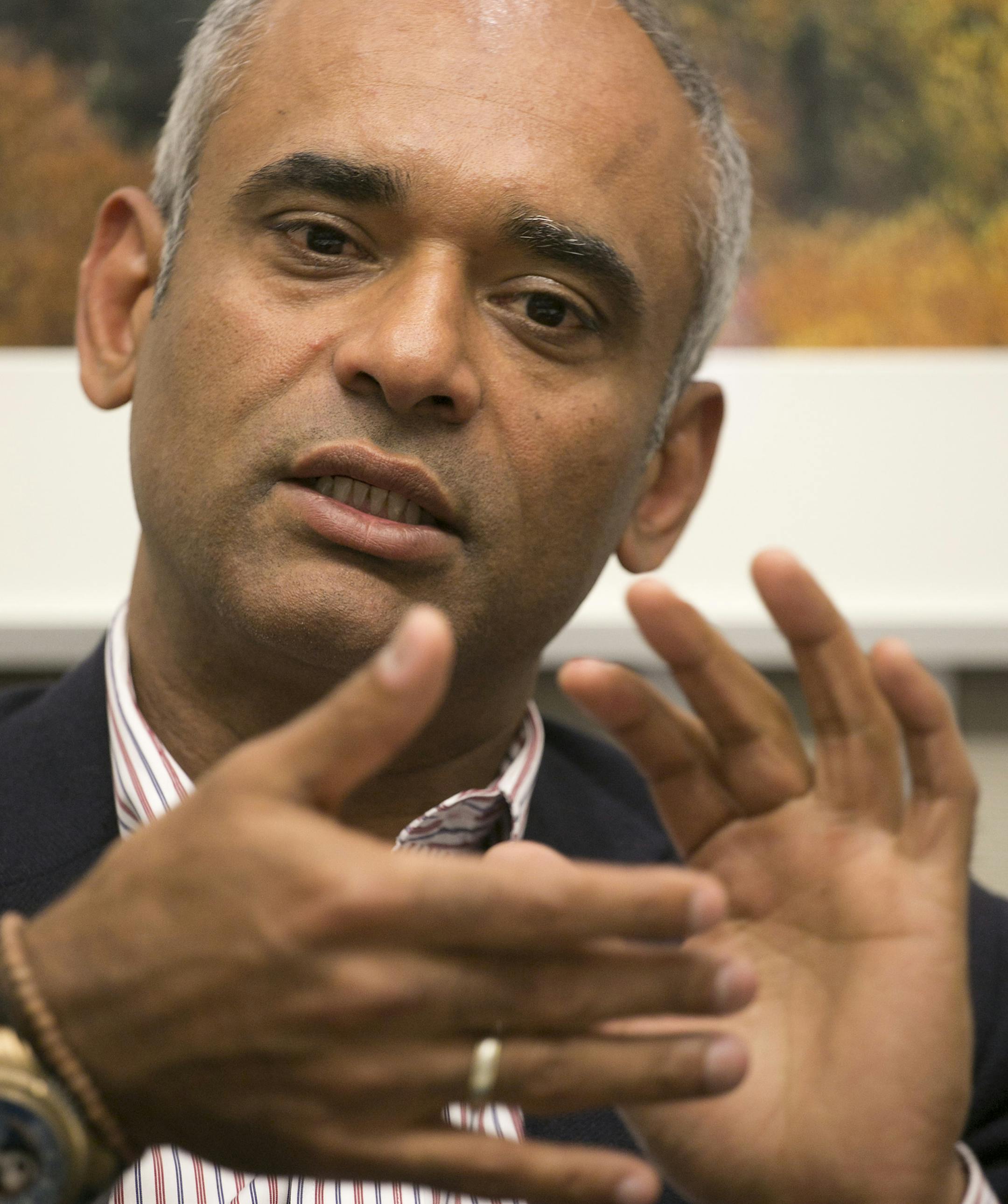 In this Wednesday, March 26, 2014 photo, Chet Kanojia, the founder and CEO of Aereo, speaks during an interview with The Associated Press, in New York. The future of Aereo, an online service that provides over-the-air TV channels, hinges on a battle with broadcasters that goes before the U.S. Supreme Court in late April 2014. (AP Photo/Mark Lennihan)