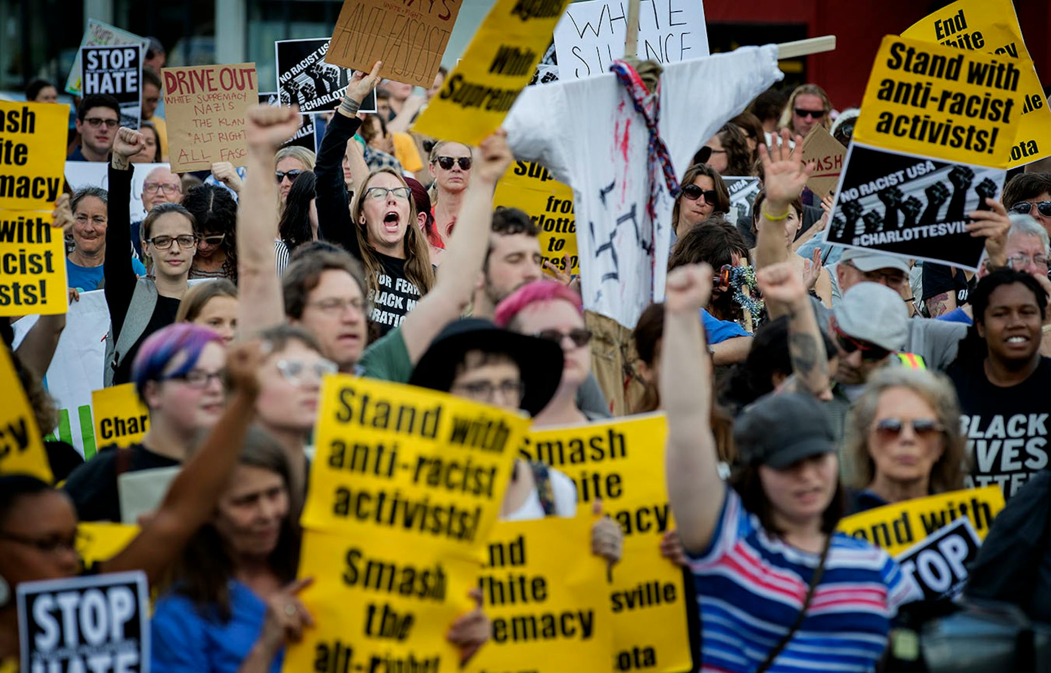Demonstrators gathered at the Solidarity with anti-racists in Charlottesville in front of the Minneapolis Republican Party office on Franklin Avenue on Monday.