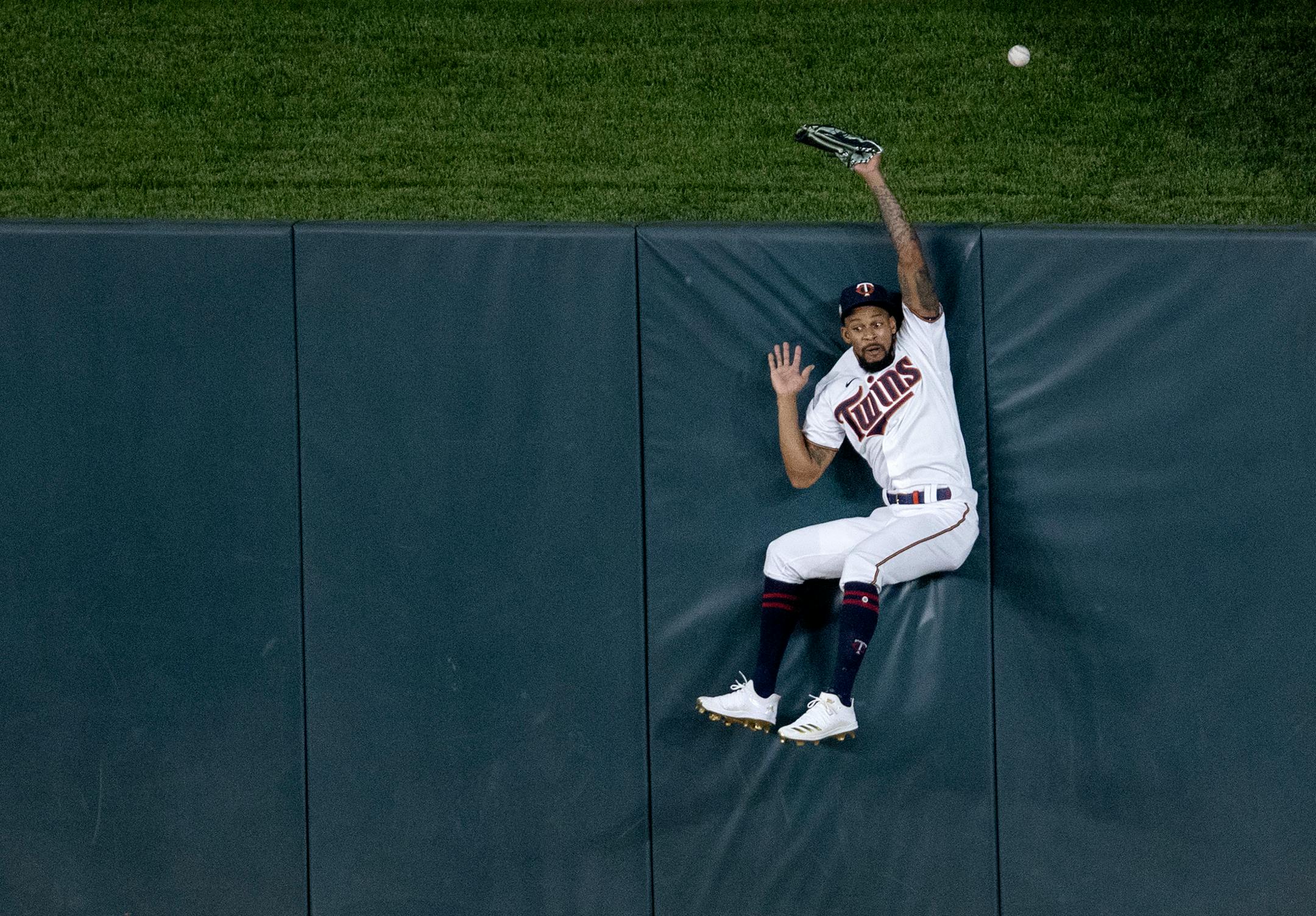 Minnesota Twins center fielder Byron Buxton hit the wall during a homerun by Tommy Edman in the eighth inning.