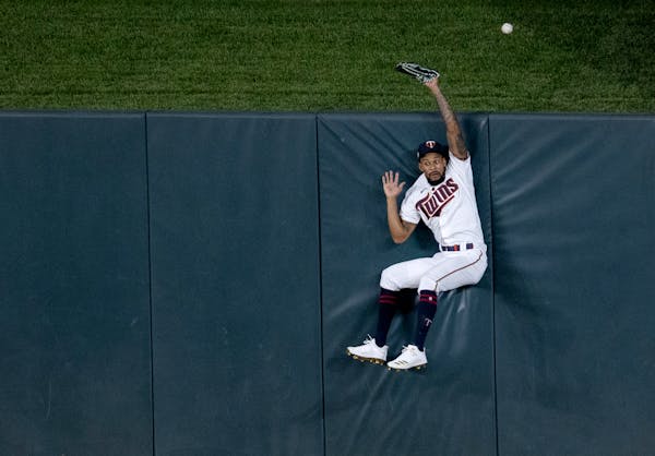 Minnesota Twins center fielder Byron Buxton hit the wall during a homerun by Tommy Edman in the eighth inning.