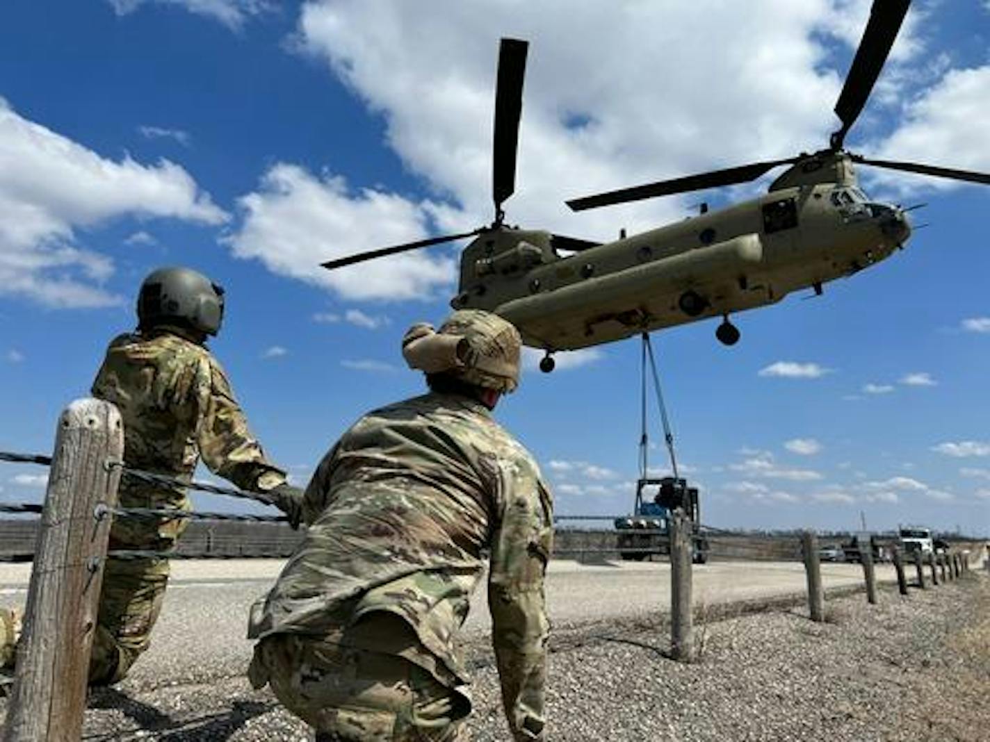 Minnesota National Guard Soldiers provide heavy-lift support for flood response operations occurring in North Dakota.