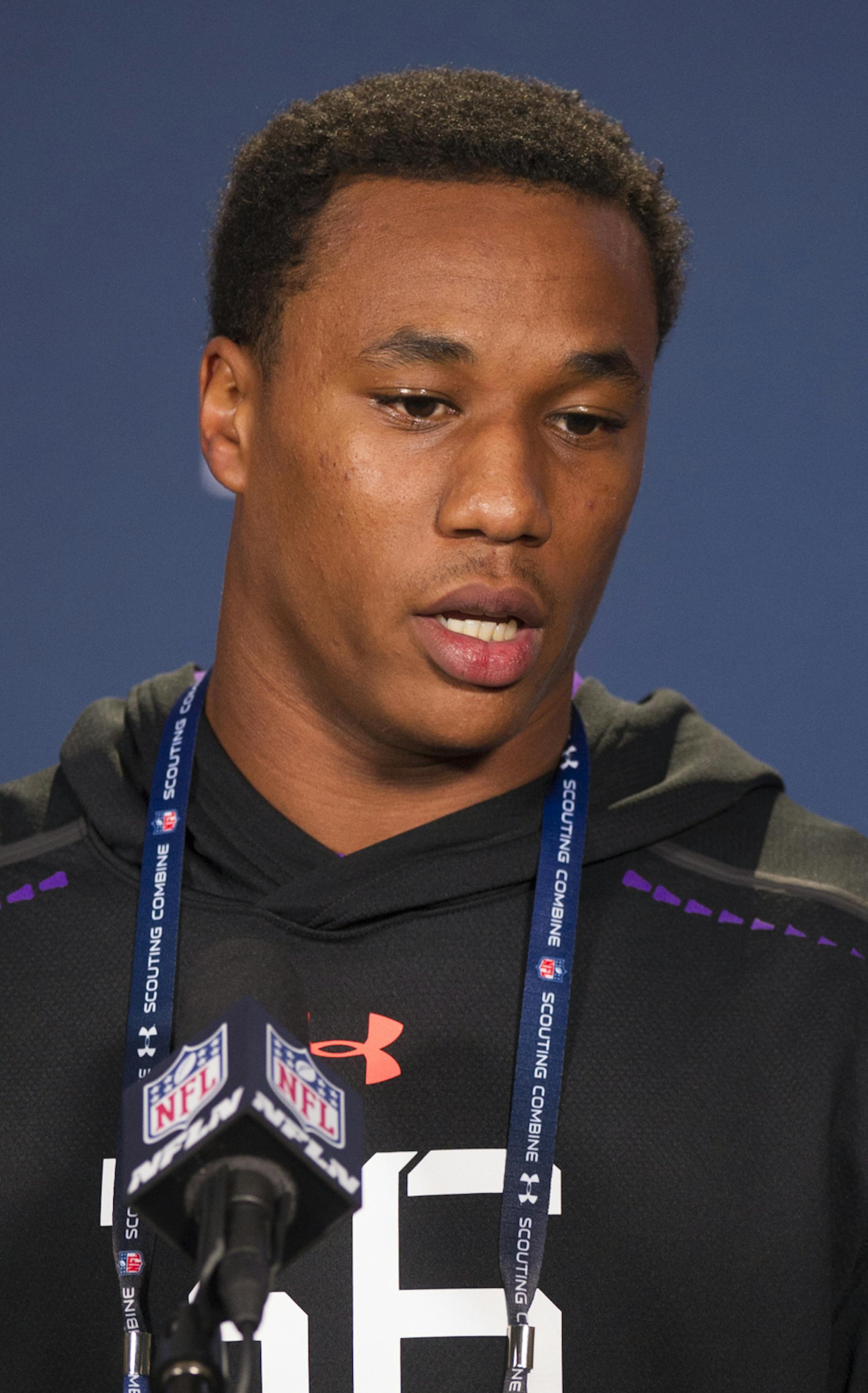 Washington defensive back Marcus Peters talks with reporters during a news conference at the NFL football scouting combine at Lucas Oil Stadium in Indianapolis, Saturday, Feb. 21, 2015. (AP Photo/Doug McSchooler) ORG XMIT: INDM106