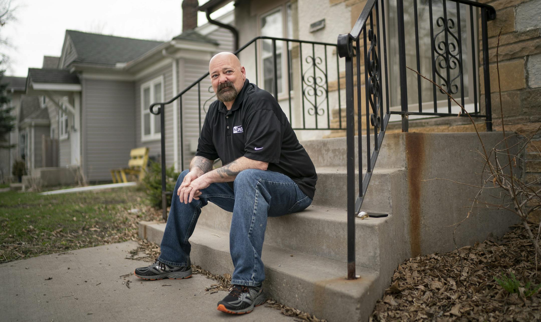 Robert Reynolds, a 54-year-old plumber and Army veteran, was last week placed in a transitional living home in south Minneapolis after being homeless for a few months after being released from jail. Photographed on the stoop of his new home in Minneapolis, Minn., on Thursday, April 23, 2020. ] RENEE JONES SCHNEIDER • renee.jones@startribune.com