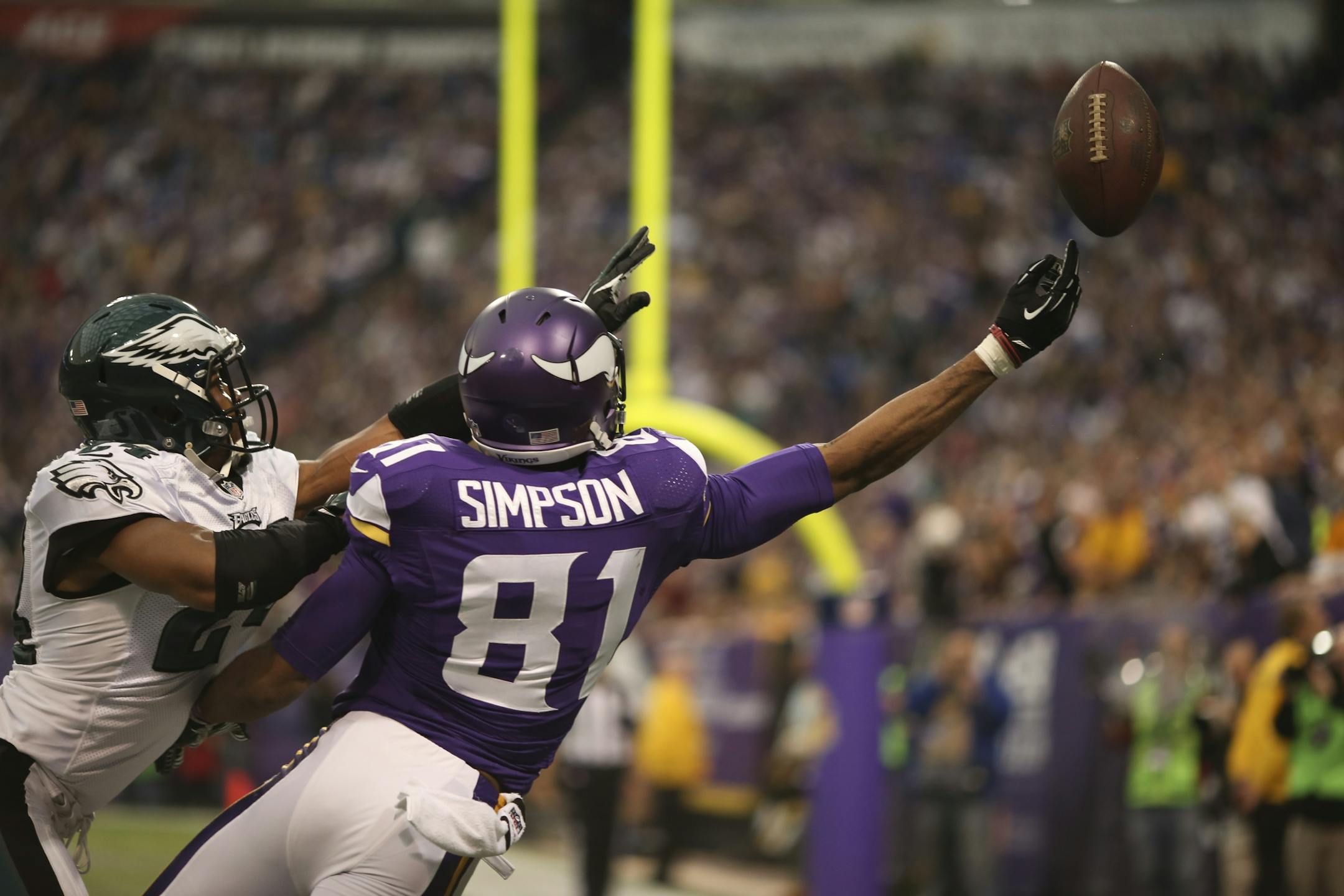 Philadelphia Eagles cornerback Bradley Fletcher (24) was called for defensive interference in the corner of the end zone while defending Minnesota Vikings wide receiver Jerome Simpson (81).