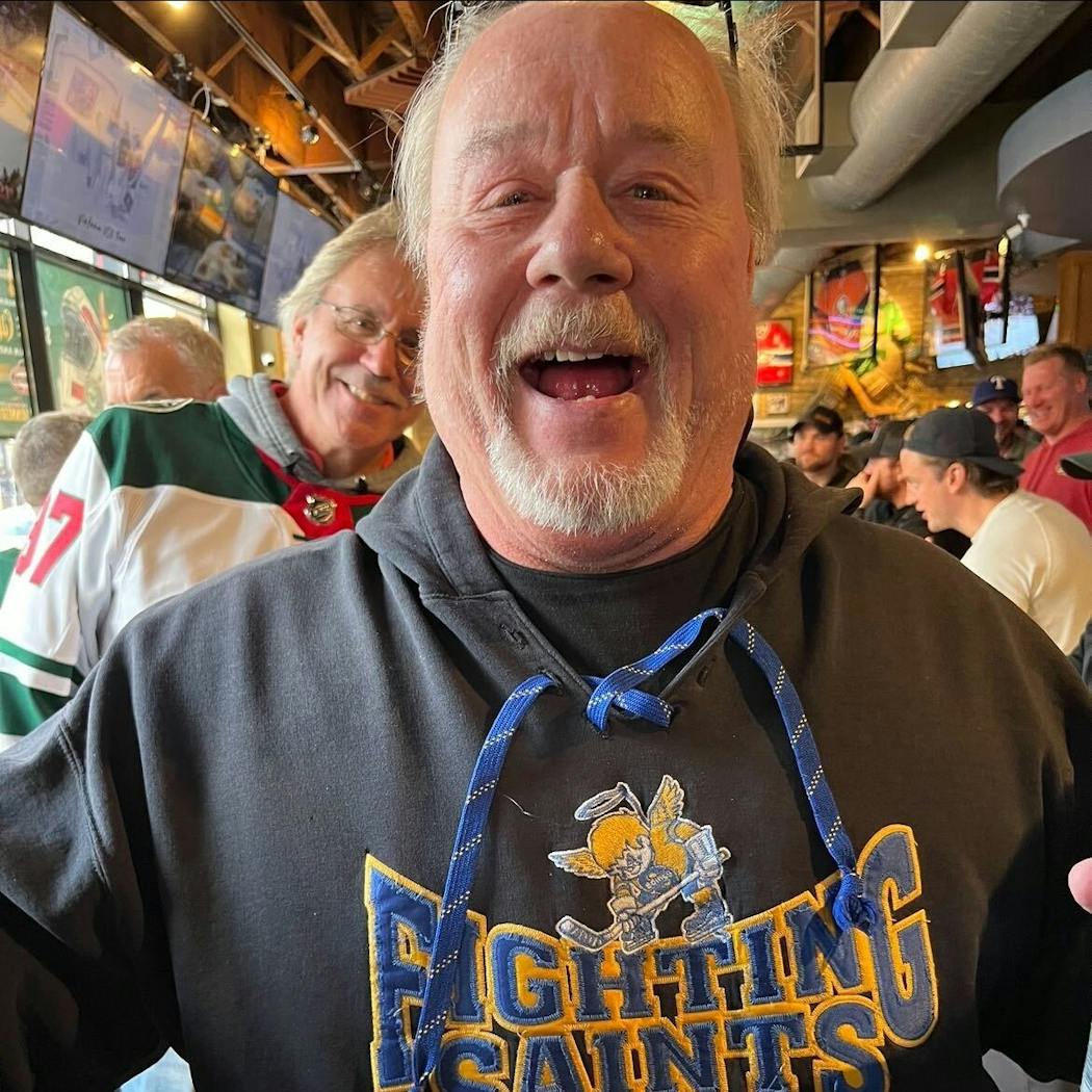Jim Murphy, fired up pregame for Wild with rest of overflow crowd at Tom Reid’s Hockey Pub, proudly shows off his Fighting Saints (1972-1977) sweatshirt. 