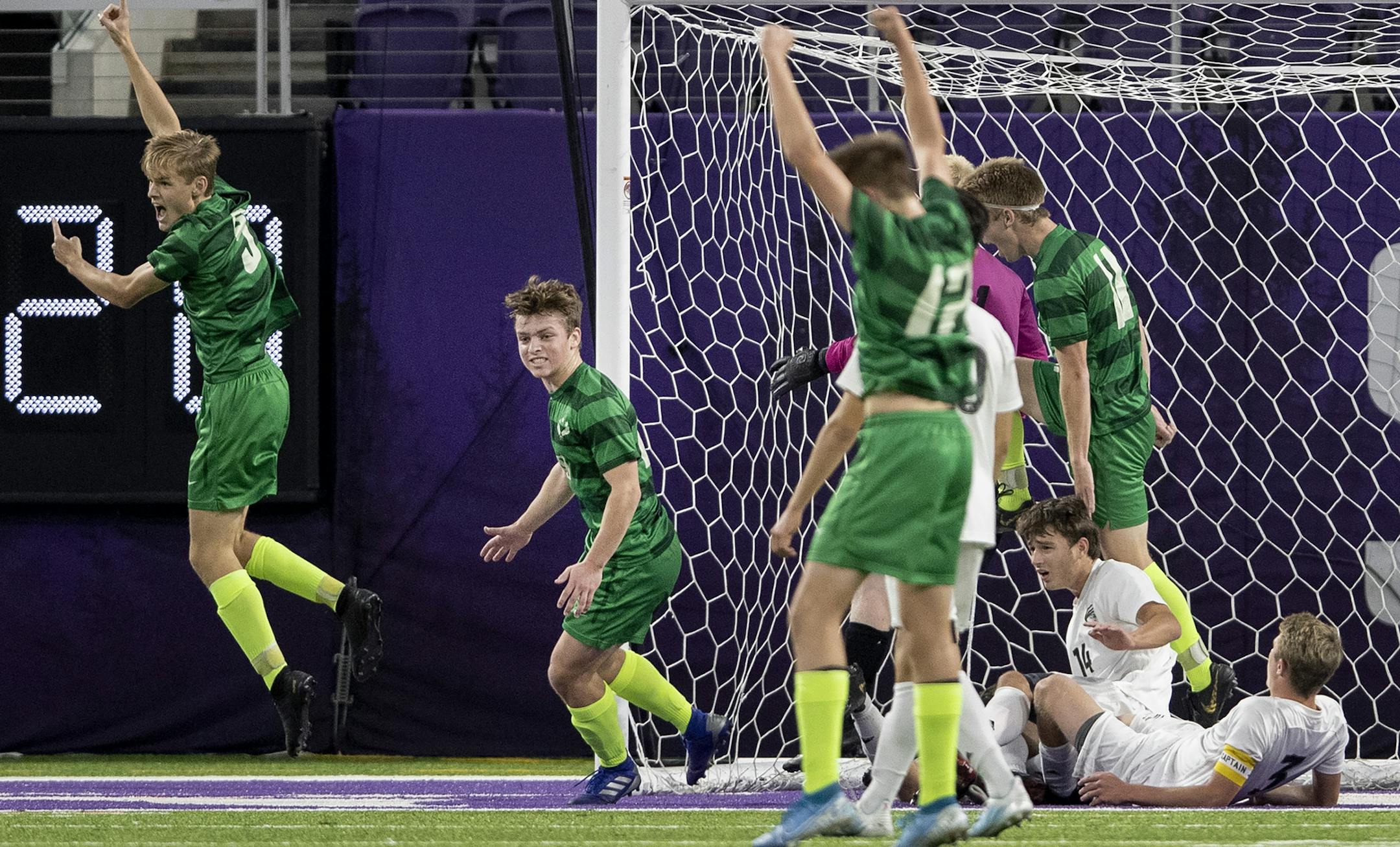 Edina players celebrated a goal by Oscar Smythe (10) (not in photo) in the first half. ] CARLOS GONZALEZ ¥ cgonzalez@startribune.com Ð Minneapolis, MN Ð October 31, 2019, U.S. Bank Stadium, High School / Prep Soccer Finals, Boys' 2A game, Edina vs. East Ridge.