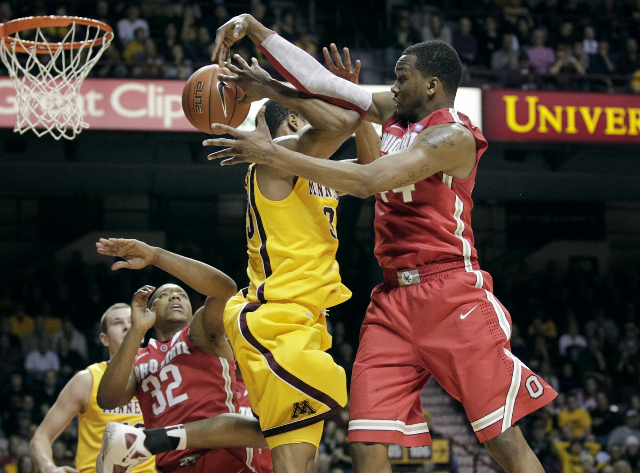 Ohio State's William Buford knocked the ball away from the Gophers' Rodney Williams during Tuesday night's game at Williams Arena. Buford finished with 24 points.