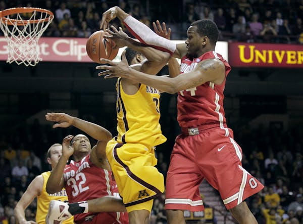 Ohio State's William Buford knocked the ball away from the Gophers' Rodney Williams during Tuesday night's game at Williams Arena. Buford finished wit