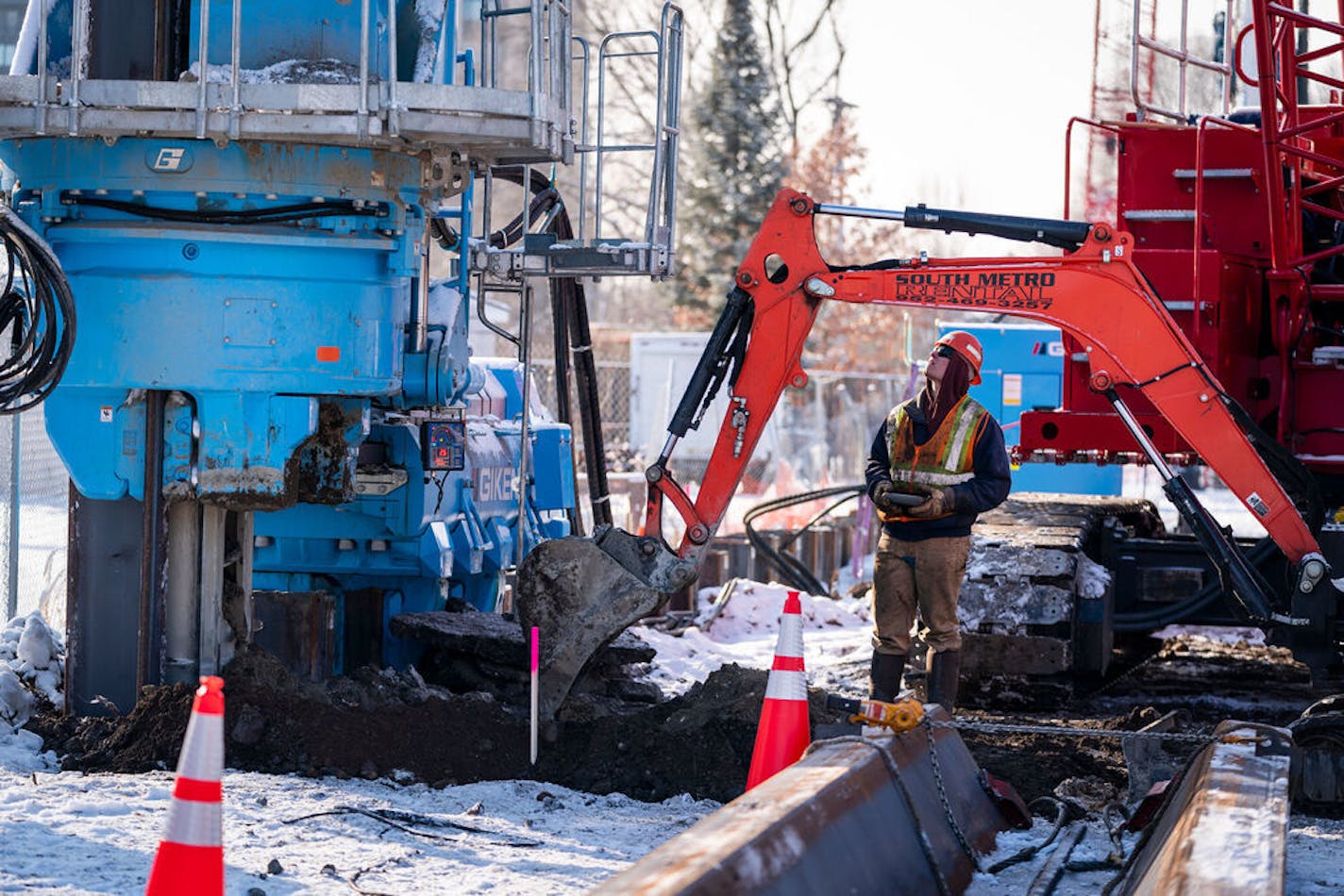 A construction worker from Lunda/McCrossan joint venture worked with a silent piler machine to start the construction of a tunnel for the Southwest light rail through the Kenilworth area of Minneapolis.